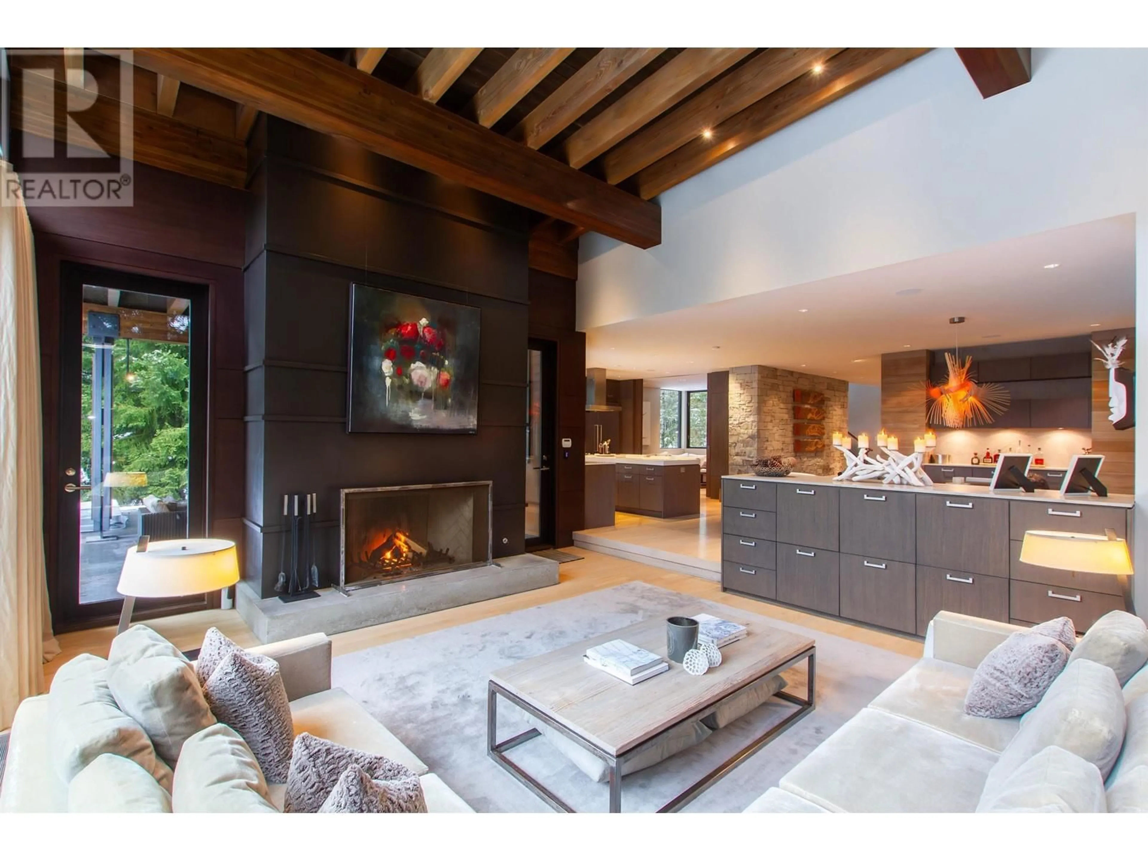 Living room with furniture, wood/laminate floor for 7134 NESTERS ROAD, Whistler British Columbia V8E0E2