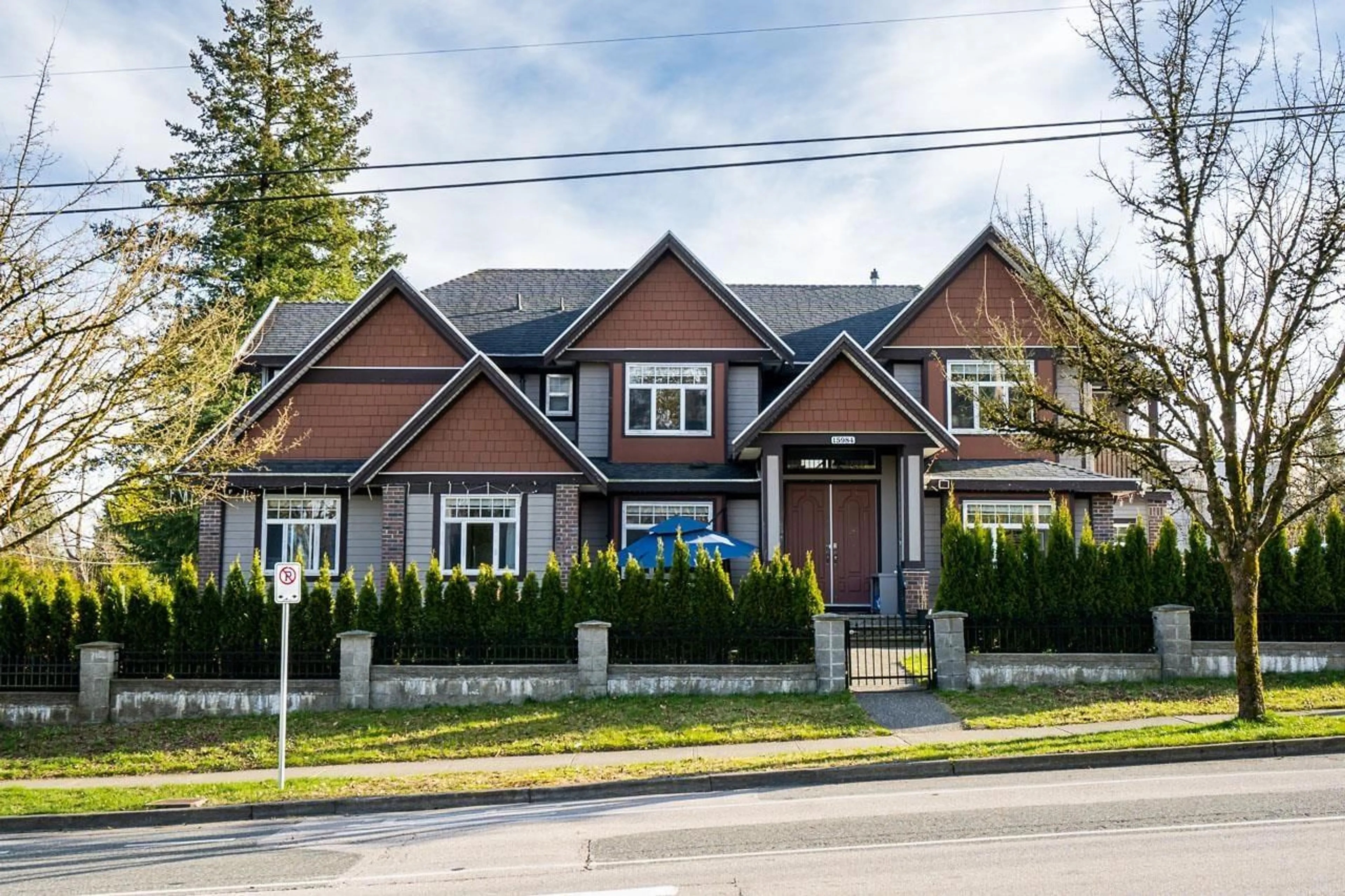 Frontside or backside of a home for 15984 92 AVENUE, Surrey British Columbia V4N2X6