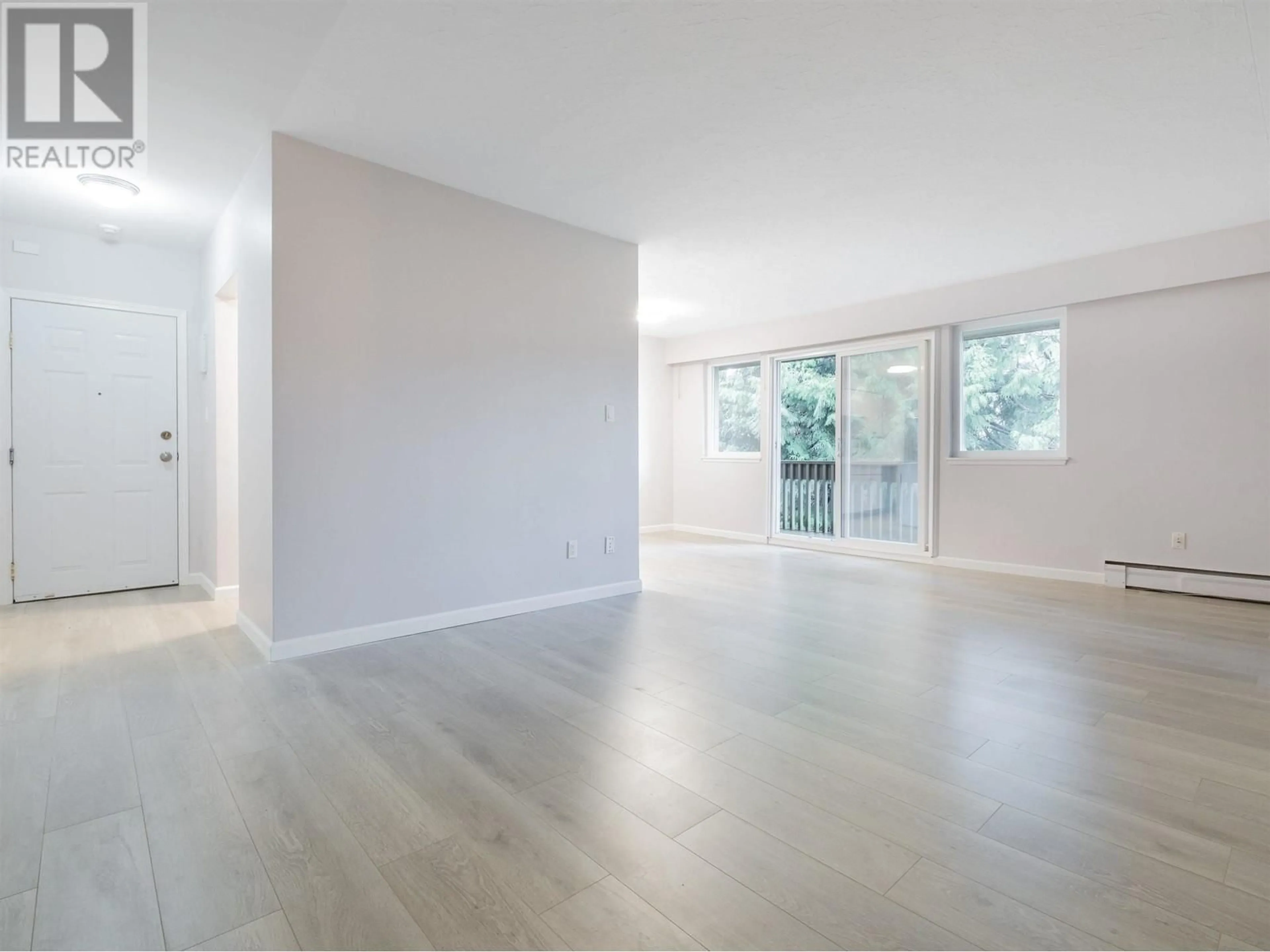 A pic of a room, wood floors for 125 5750 HASTINGS STREET, Burnaby British Columbia V5B1R6