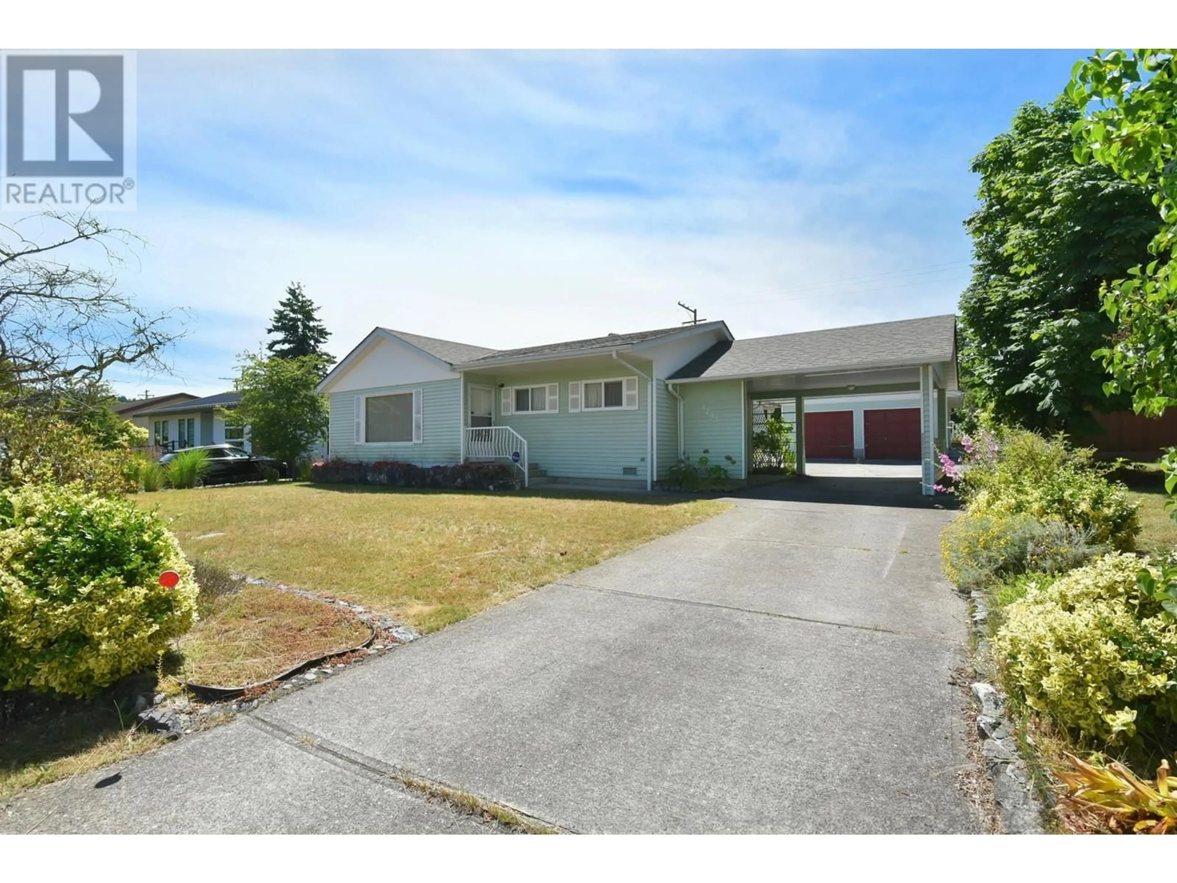 Frontside or backside of a home for 5703 DOLPHIN STREET, Sechelt British Columbia V0N3A0