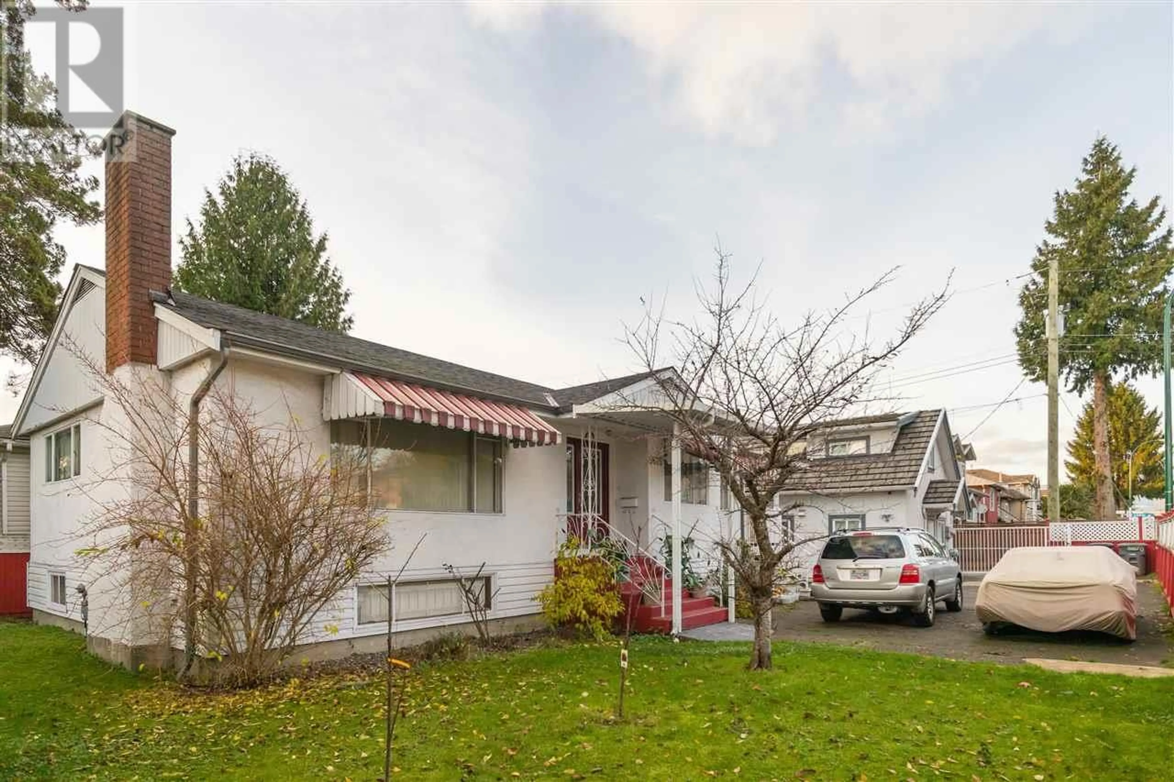 Home with vinyl exterior material, street for 5675 RUPERT STREET, Vancouver British Columbia V5R2K4