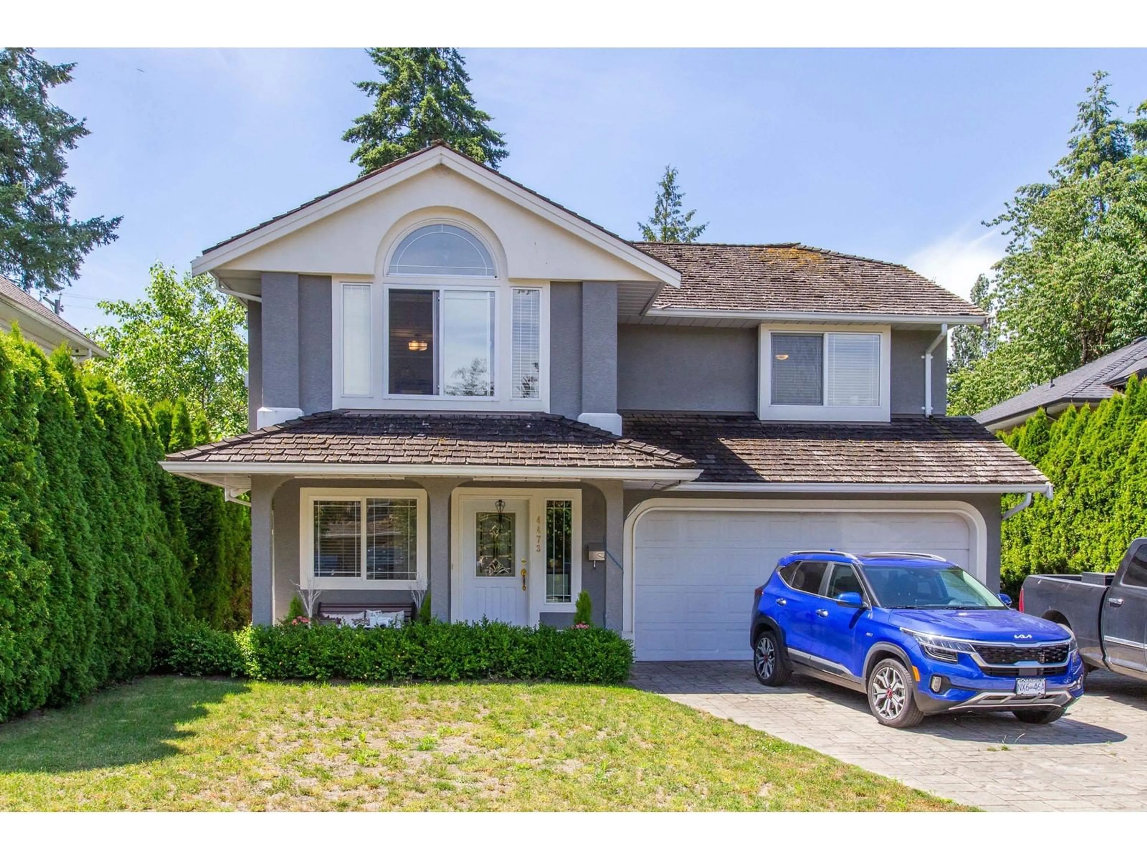 Frontside or backside of a home for 4473 208A STREET, Langley British Columbia V3A7R4