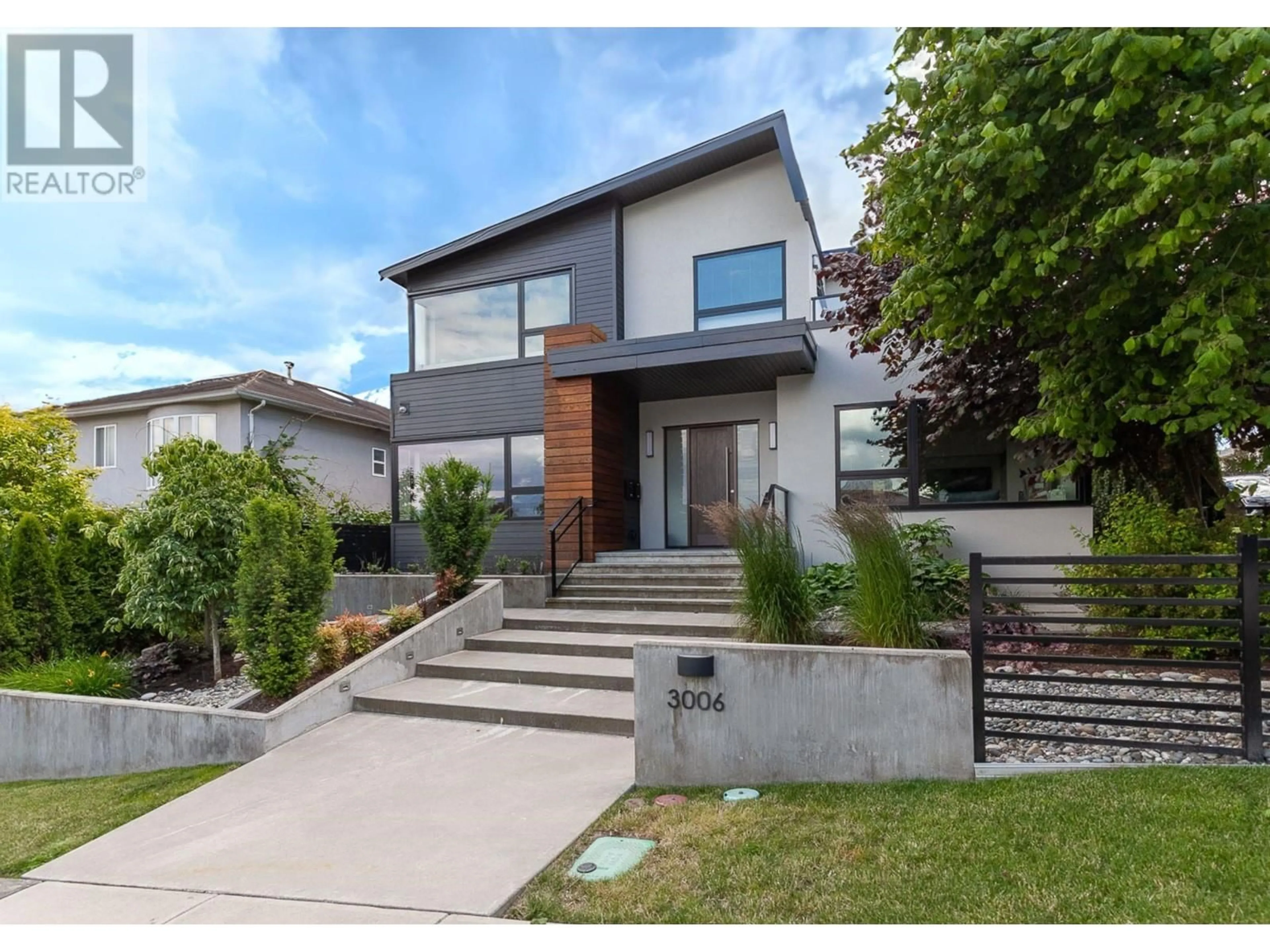 Frontside or backside of a home for 3006 E 3RD AVENUE, Vancouver British Columbia V5M1J1