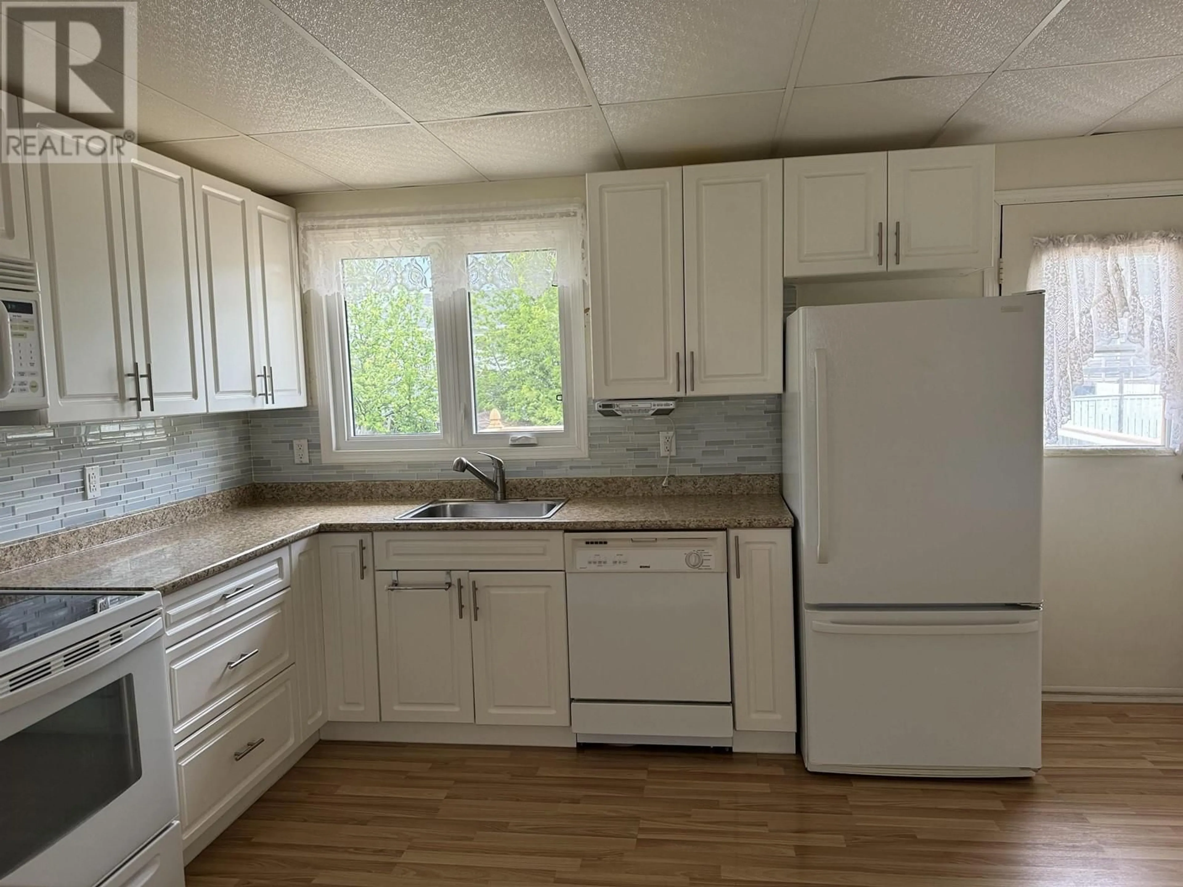 Standard kitchen, wood floors, cottage for 11 BAKER ROAD, Mackenzie British Columbia V0J2C0