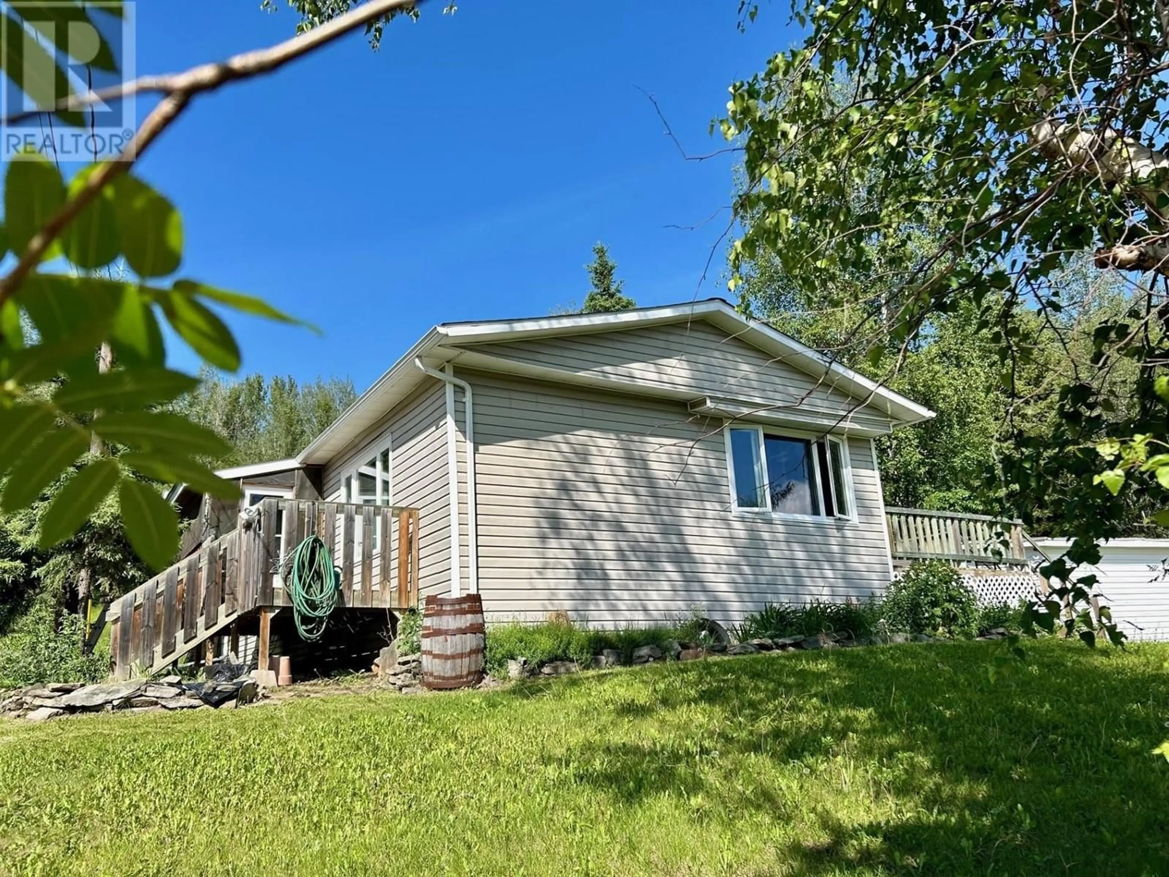 A pic from outside/outdoor area/front of a property/back of a property/a pic from drone, water/lake/river/ocean view for 7708 MILE 307 FRONTAGE ROAD, Fort Nelson British Columbia V0C1R0