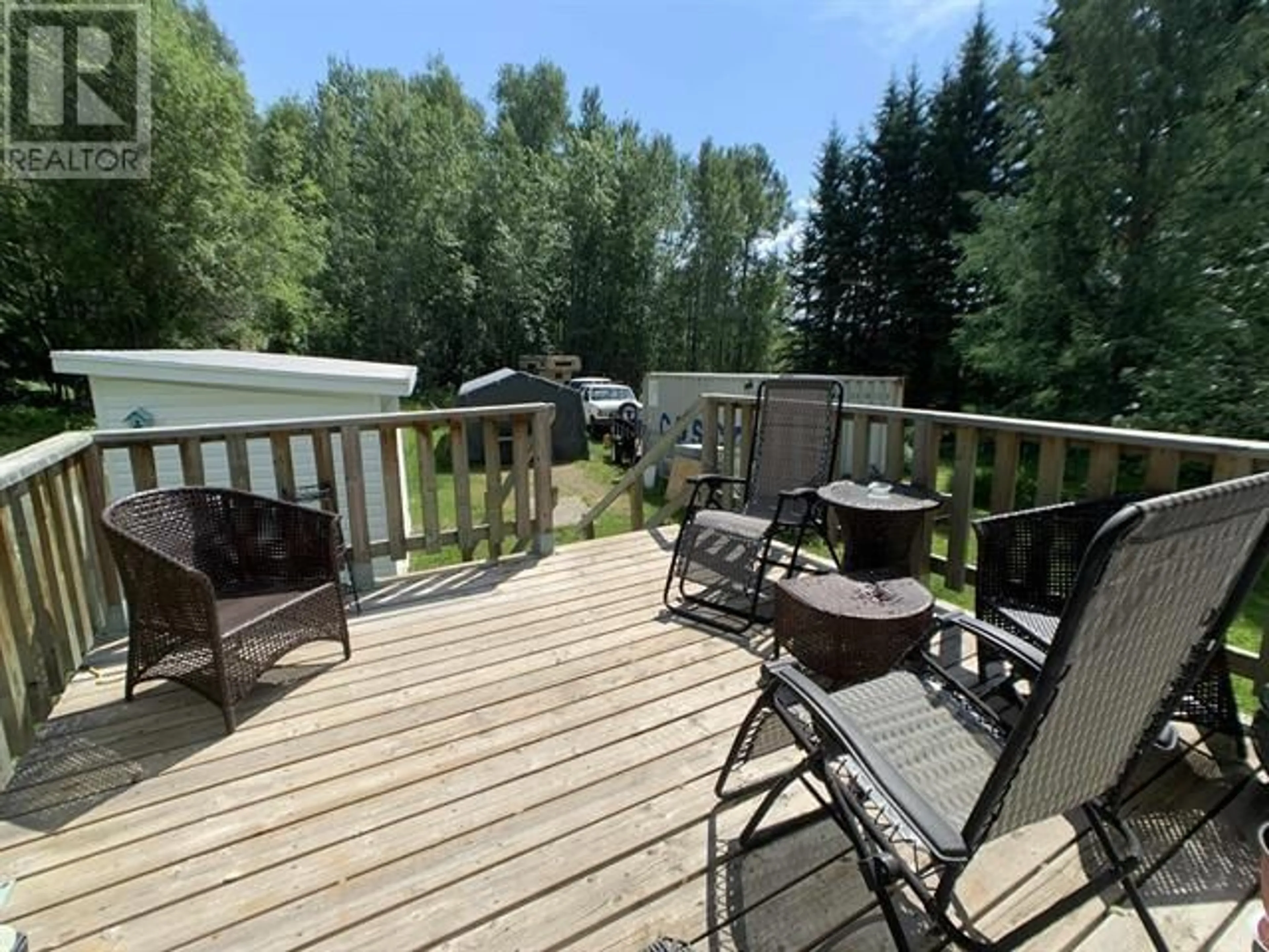 Patio, the fenced backyard for 7708 MILE 307 FRONTAGE ROAD, Fort Nelson British Columbia V0C1R0