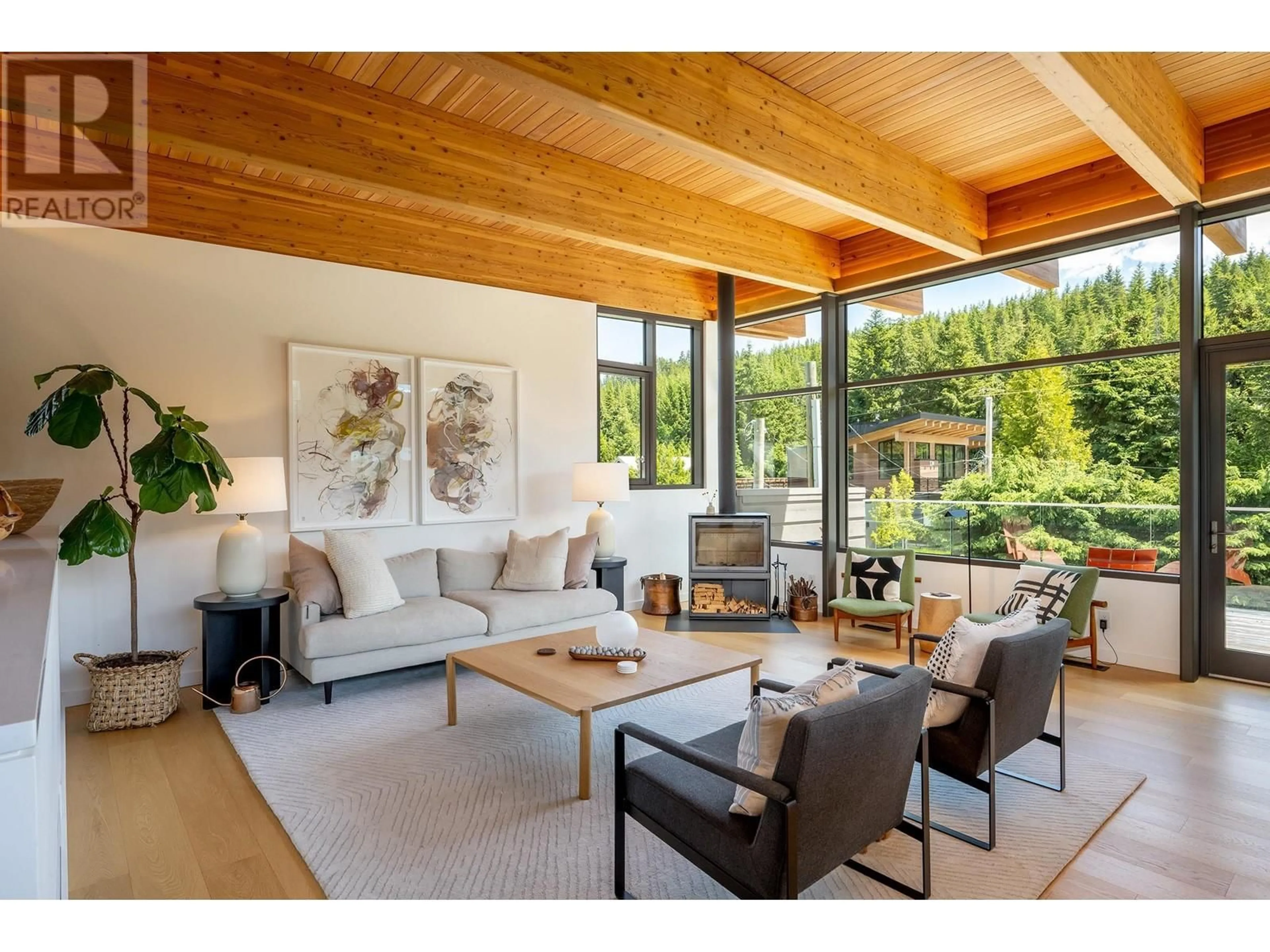 Living room with furniture, wood/laminate floor for 7325 TONI SAILER LANE, Whistler British Columbia V8E0E3