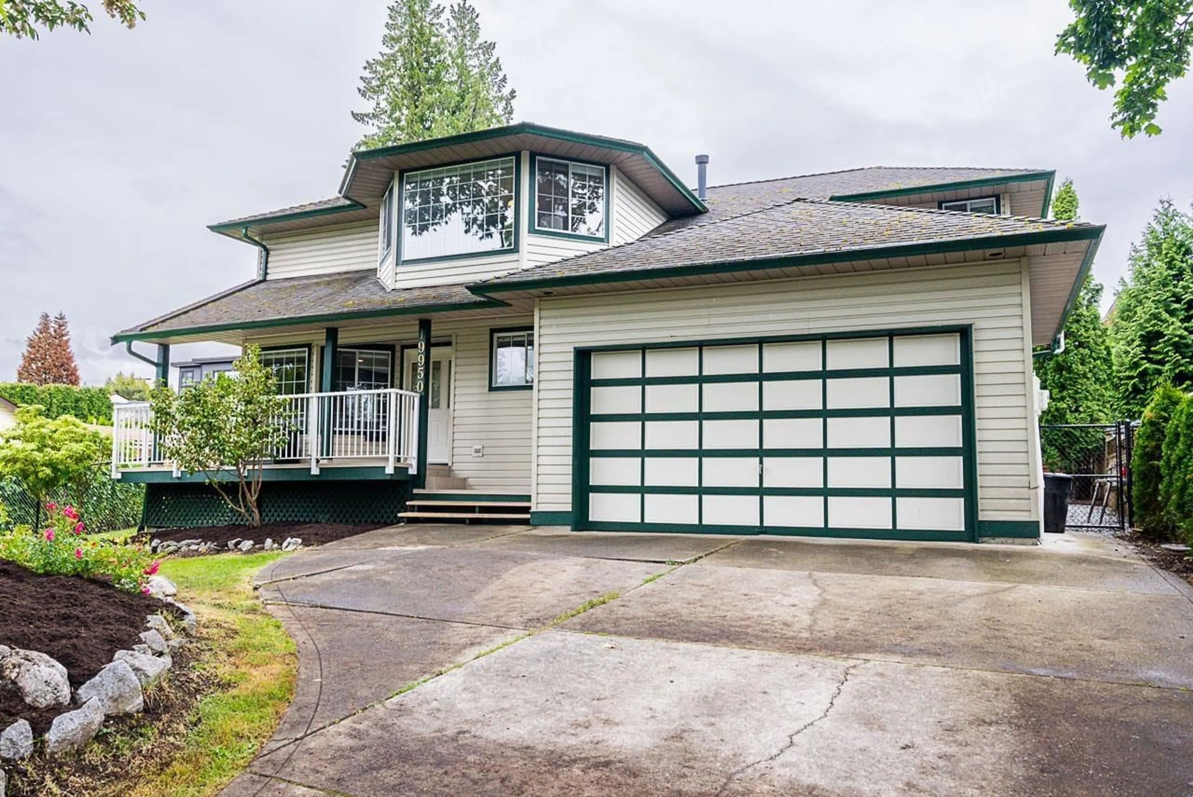 Frontside or backside of a home for 19950 48A AVENUE, Langley British Columbia V3A6Z7