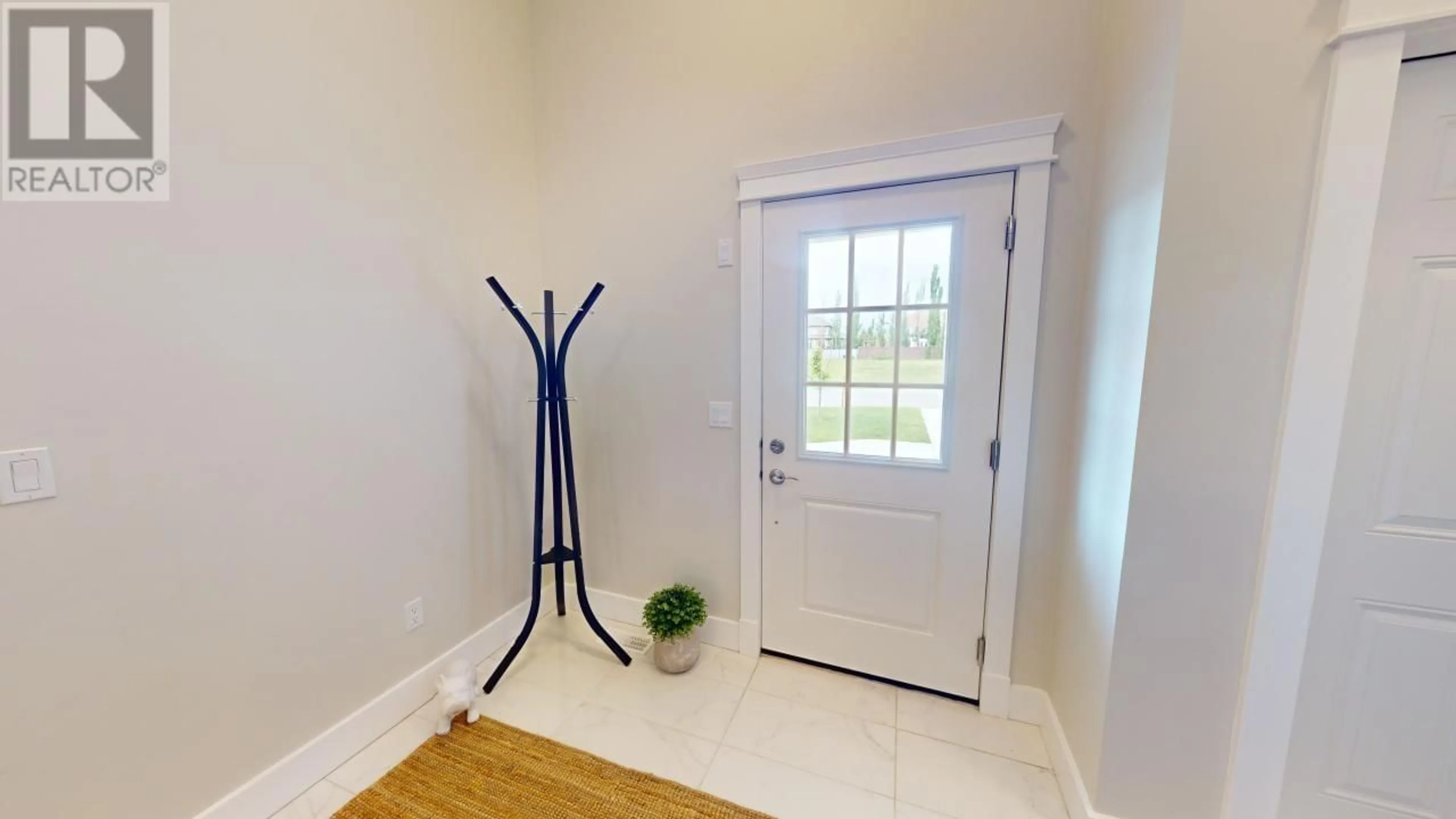 Indoor entryway for 10220 115 AVENUE, Fort St. John British Columbia V1J0P8