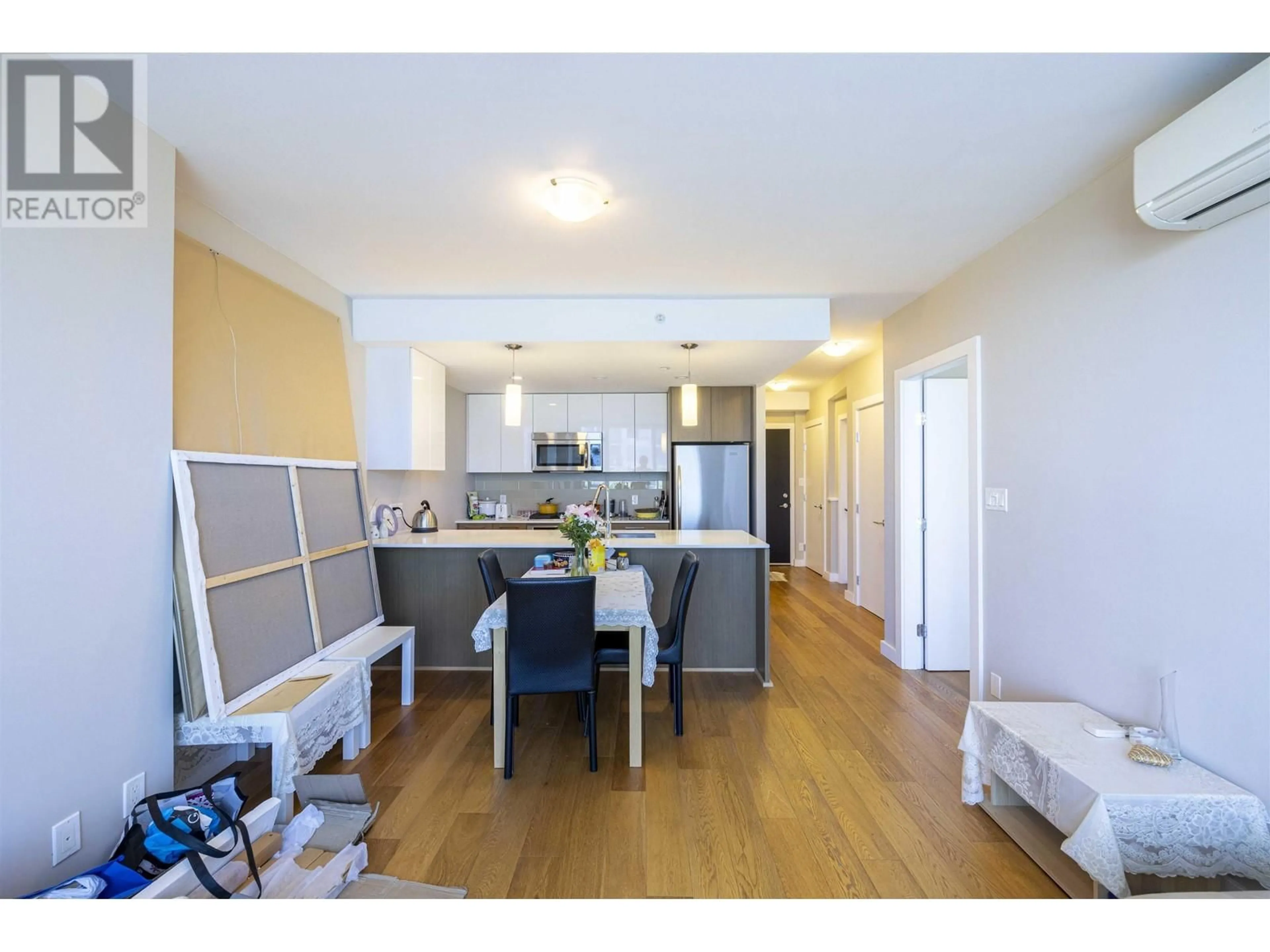 Open concept kitchen, wood/laminate floor for 6009 - 5511 HOLLYBRIDGE WAY, Richmond British Columbia V7C0A3