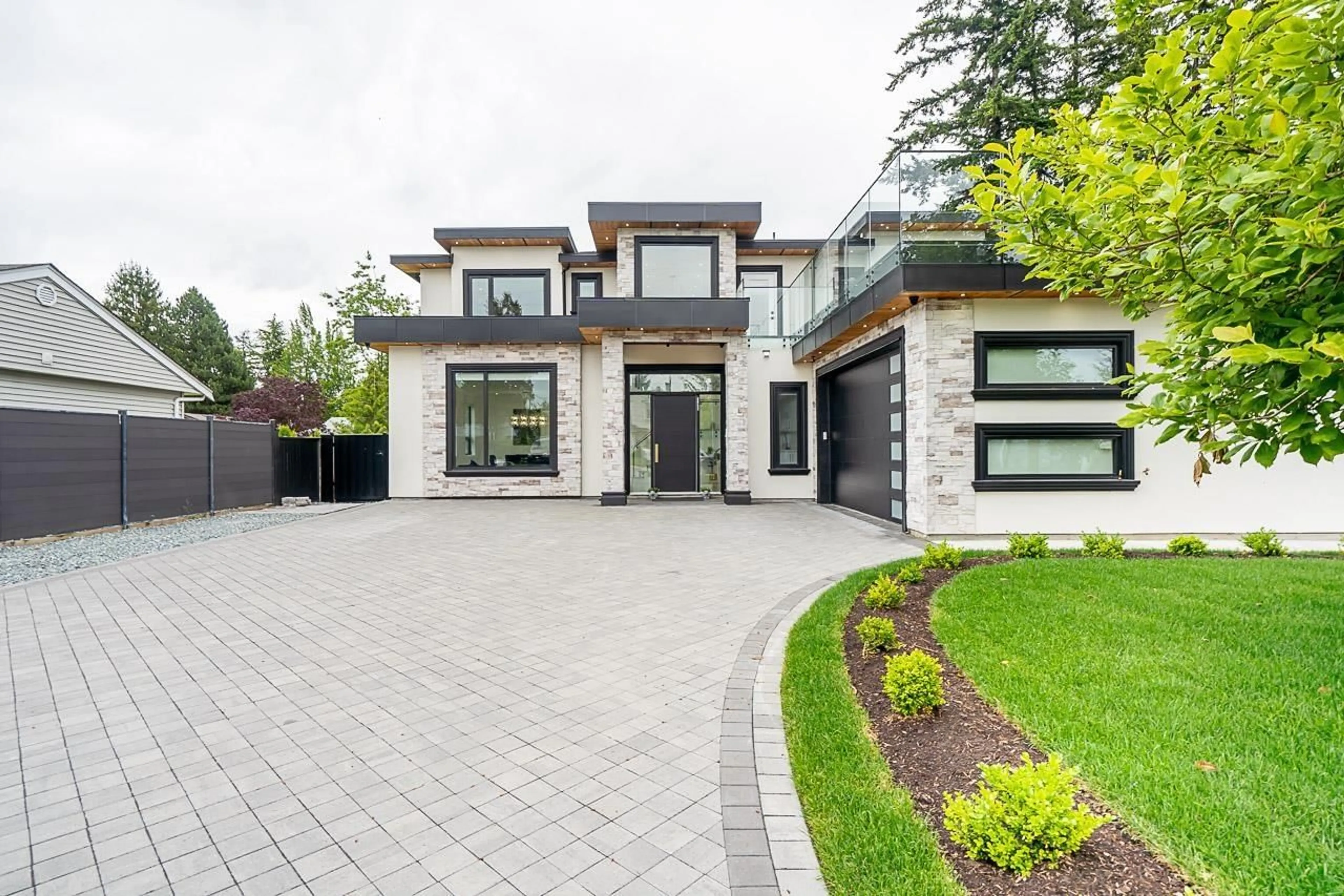 Home with brick exterior material for 6052 172 STREET, Surrey British Columbia V3S3Z7