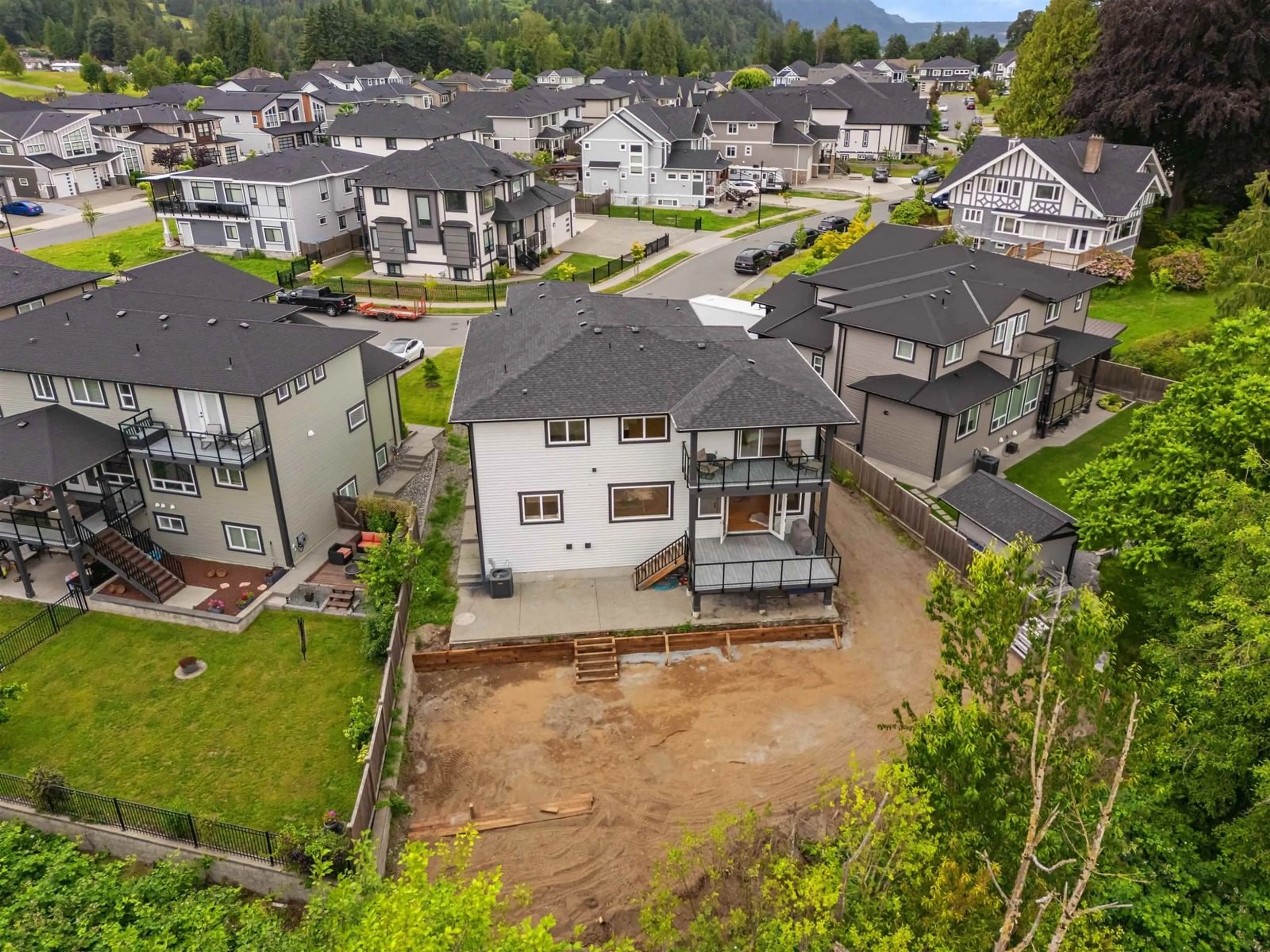 Frontside or backside of a home, the fenced backyard for 35270 EWERT AVENUE, Mission British Columbia V2V6S6