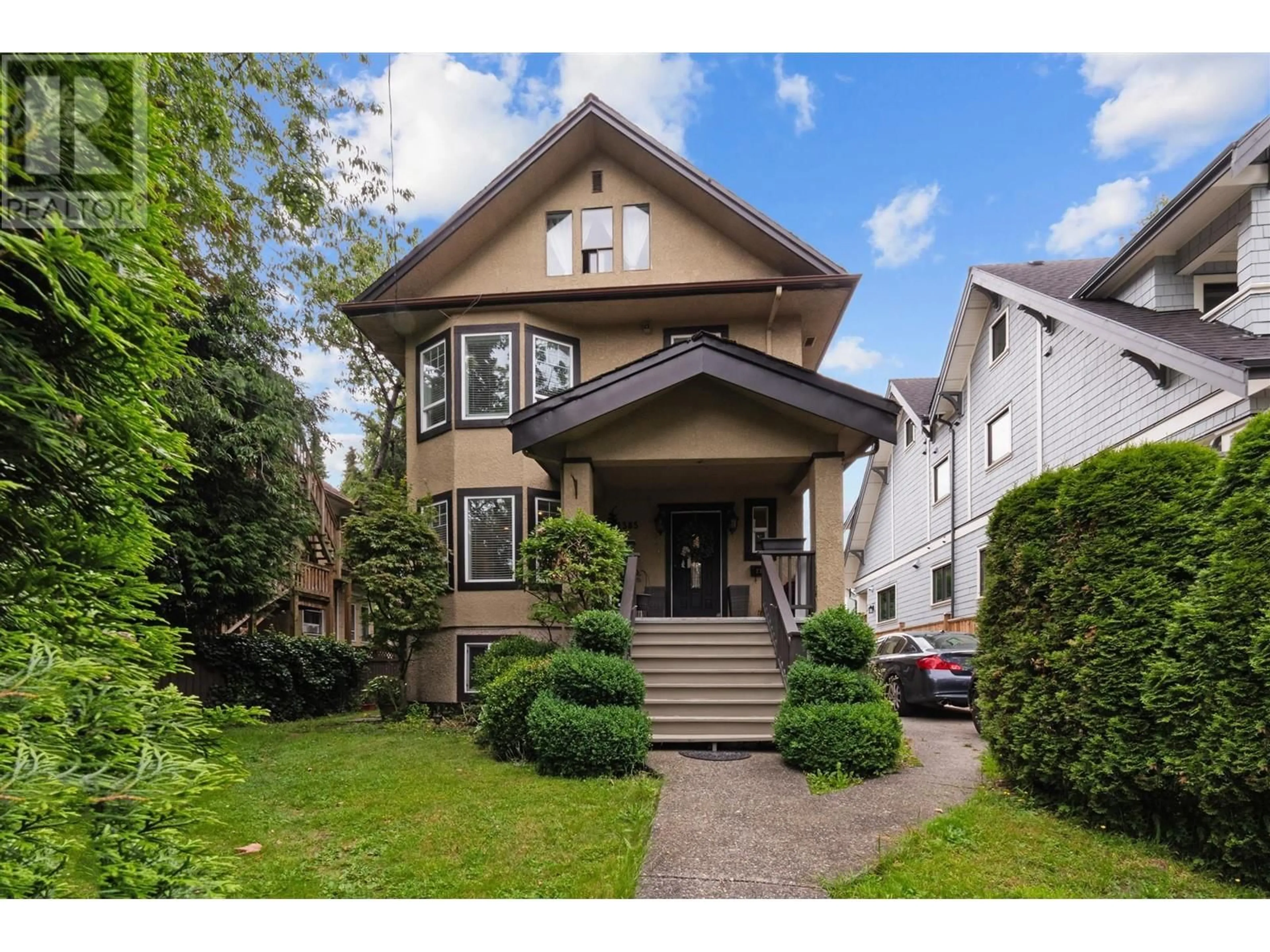 Frontside or backside of a home for 2385 W 7TH AVENUE, Vancouver British Columbia V6K1Y4