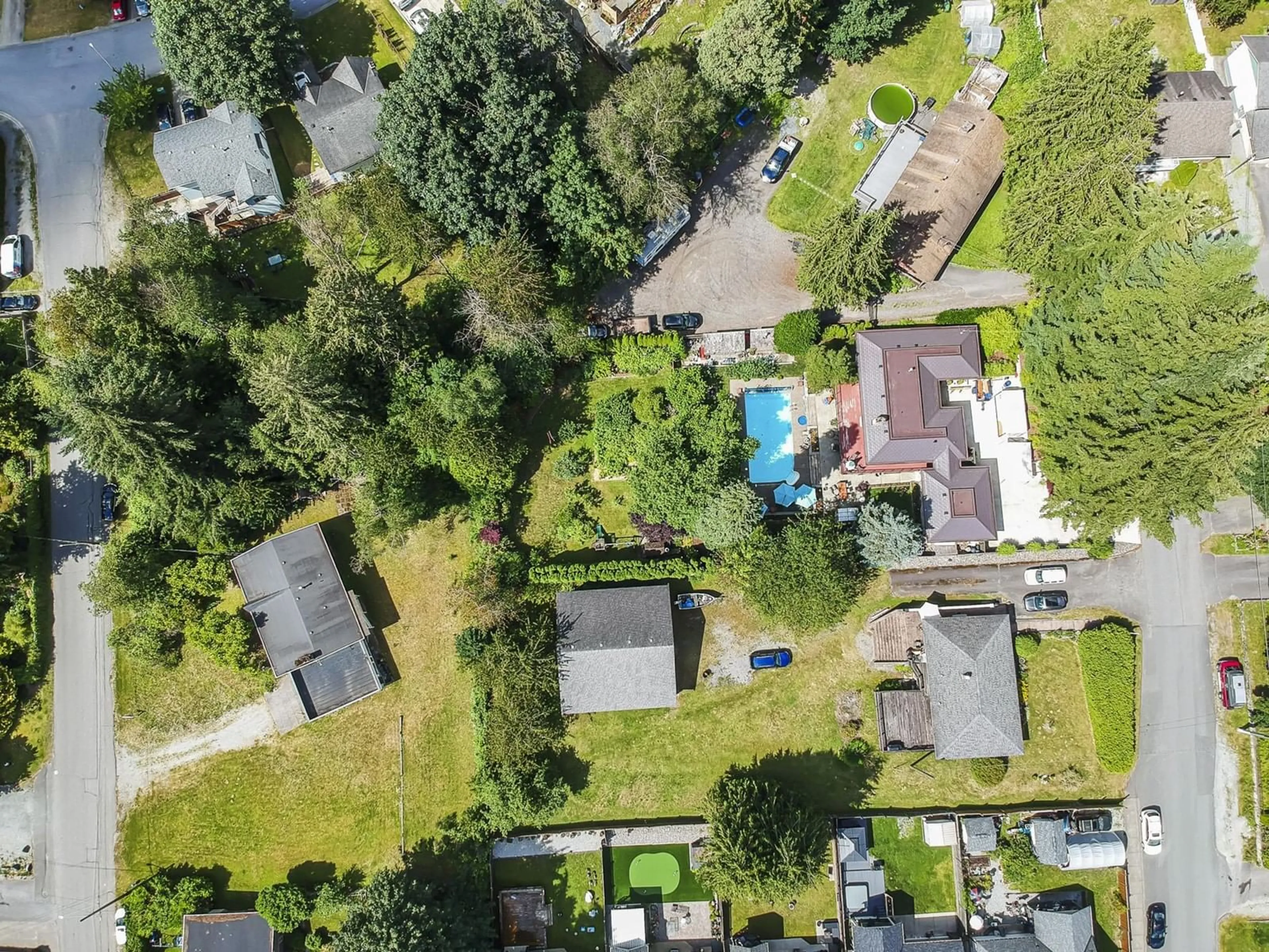 A pic from outside/outdoor area/front of a property/back of a property/a pic from drone, street for 7680 STRACHAN, Mission British Columbia V2V3L3