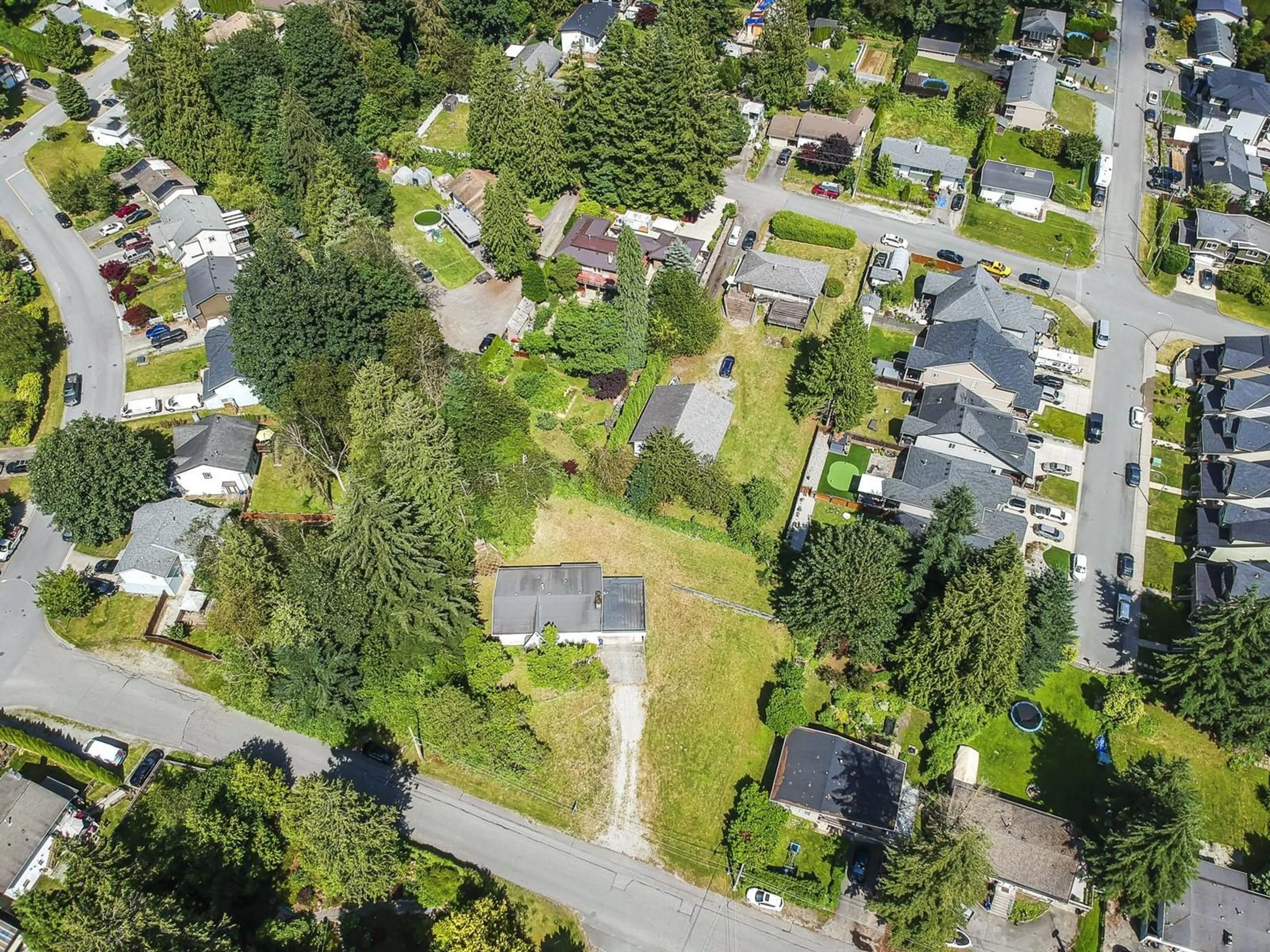 A pic from outside/outdoor area/front of a property/back of a property/a pic from drone, street for 7680 STRACHAN, Mission British Columbia V2V3L3