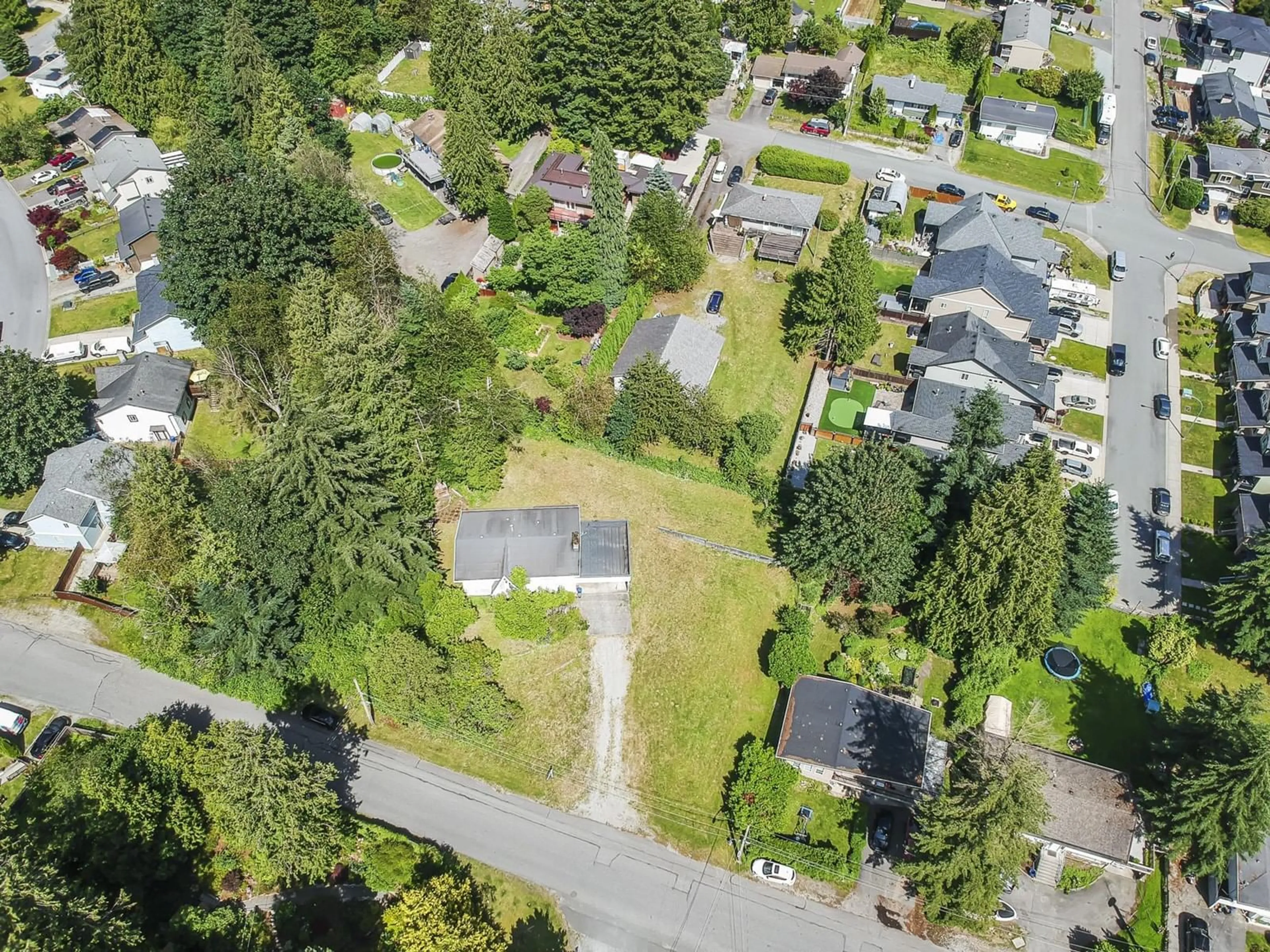 A pic from outside/outdoor area/front of a property/back of a property/a pic from drone, street for 7680 STRACHAN, Mission British Columbia V2V3L3