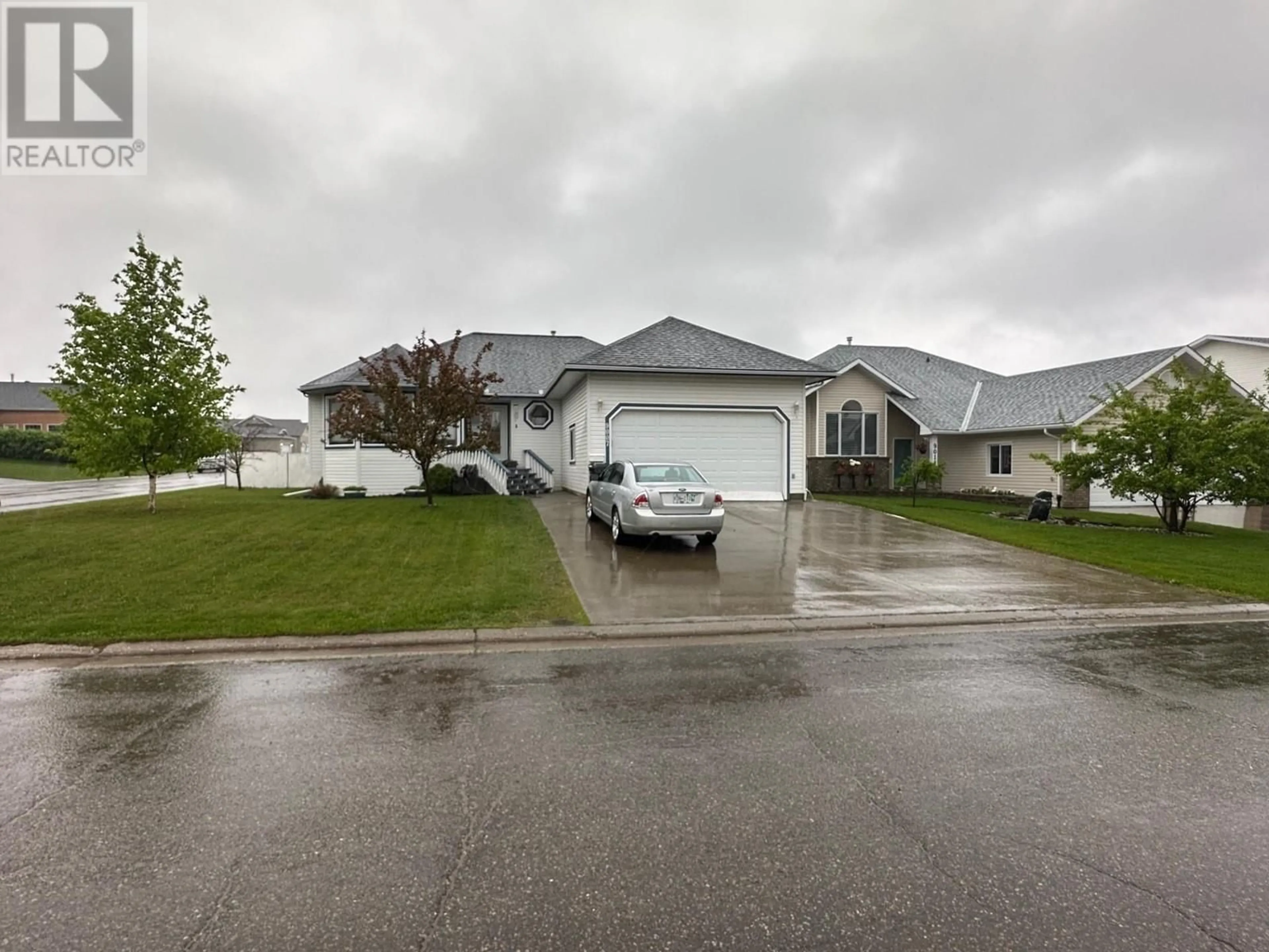 Frontside or backside of a home for 9007 114 AVENUE, Fort St. John British Columbia V1J6P5