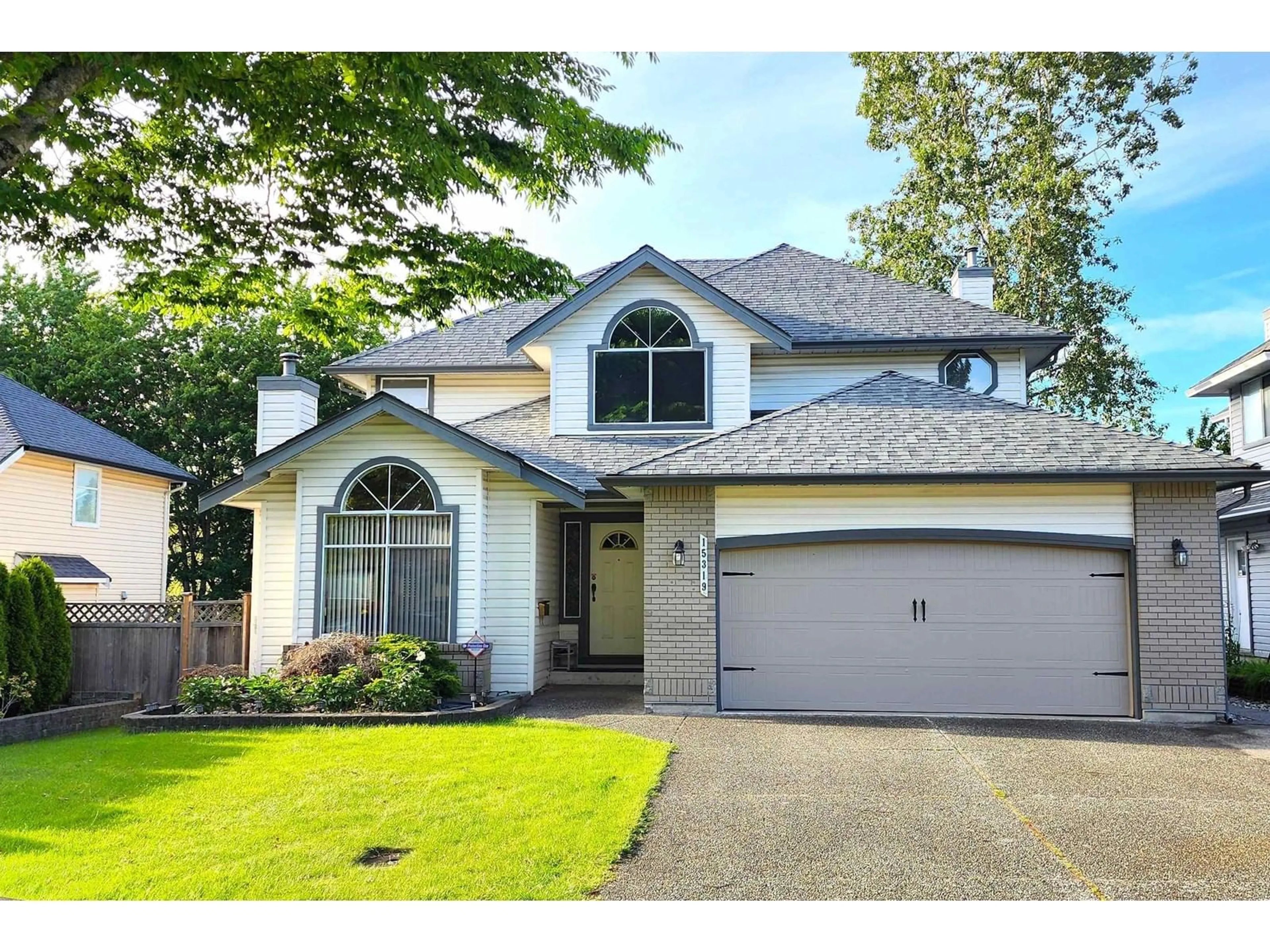 Frontside or backside of a home for 15319 111A AVENUE, Surrey British Columbia V3R0G4