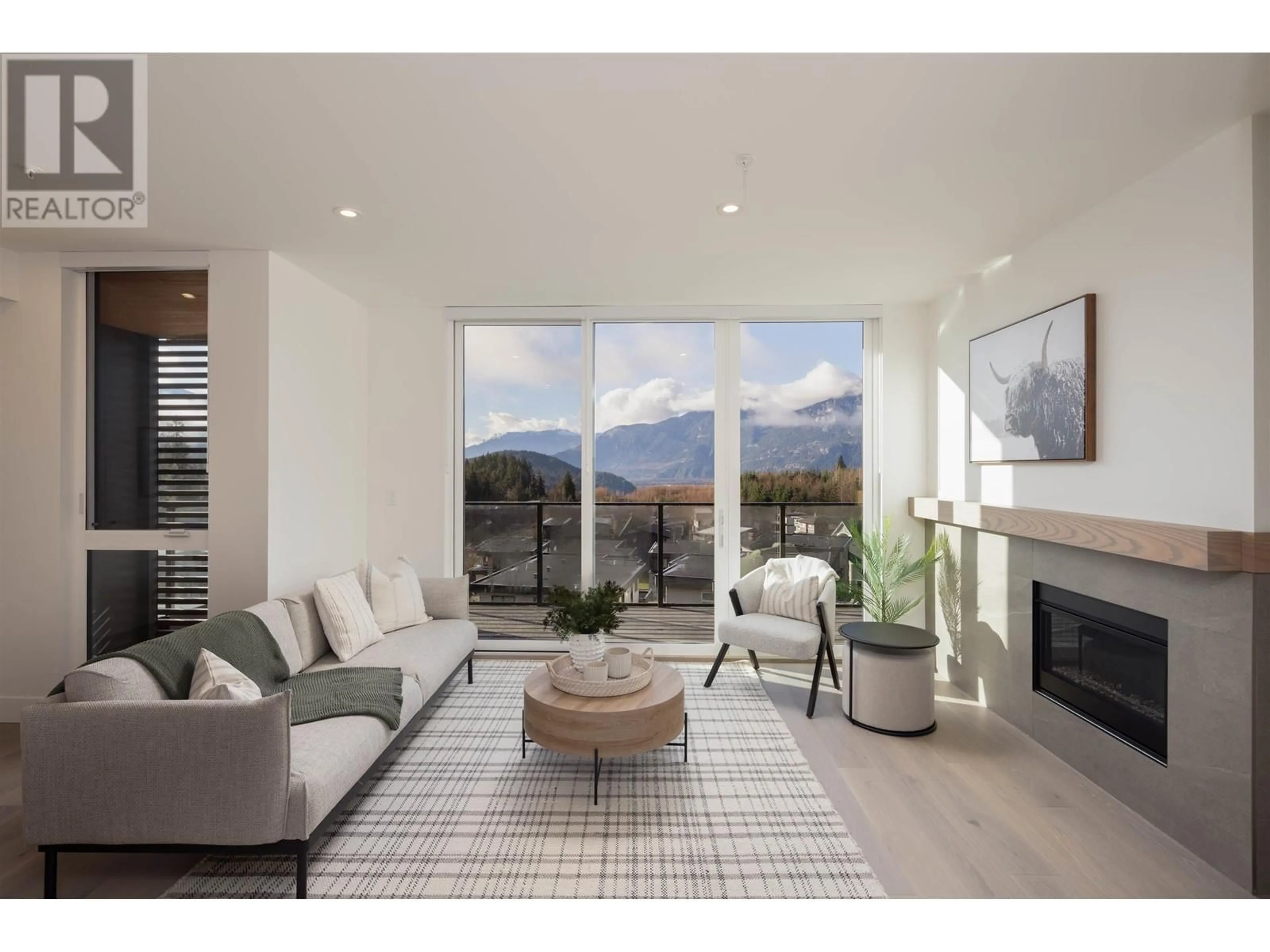 Living room, wood floors for 307 3405 MAMQUAM ROAD, Squamish British Columbia V8B1E4