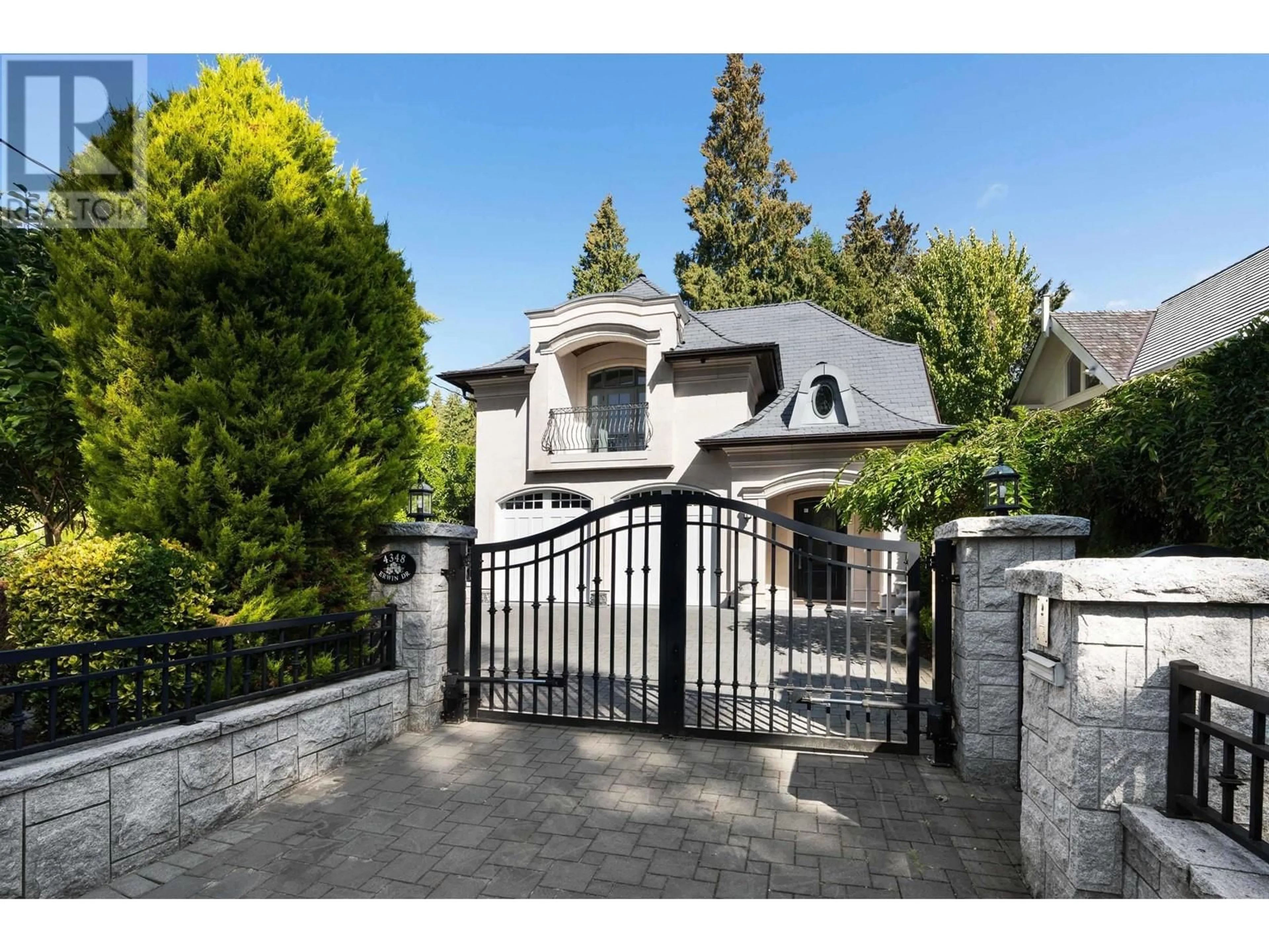 Frontside or backside of a home, the fenced backyard for 4348 ERWIN DRIVE, West Vancouver British Columbia V7V1H6