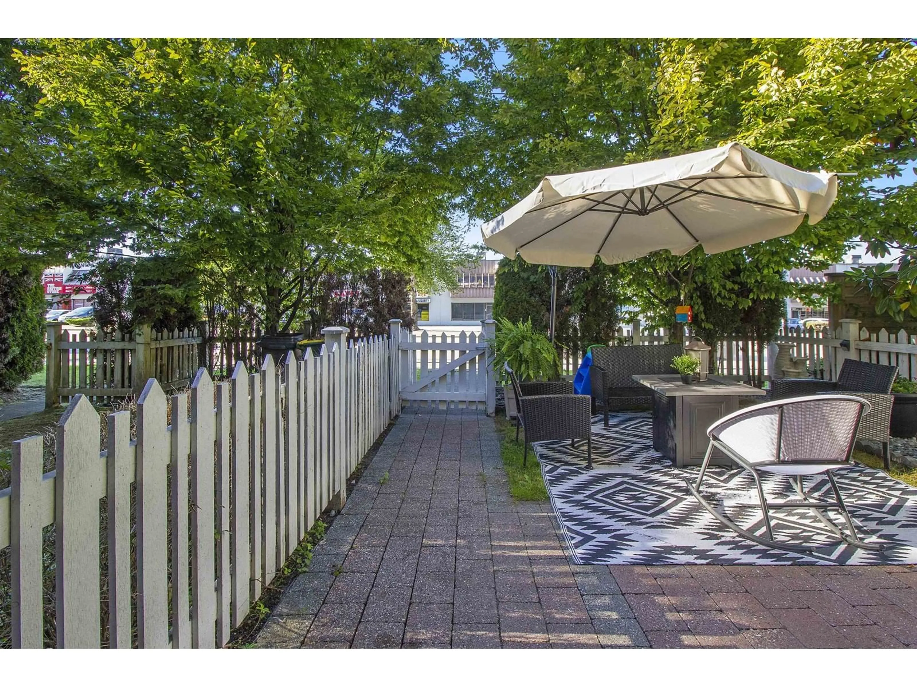 Patio, the fenced backyard for 101 13368 72 AVENUE, Surrey British Columbia V3W2N6