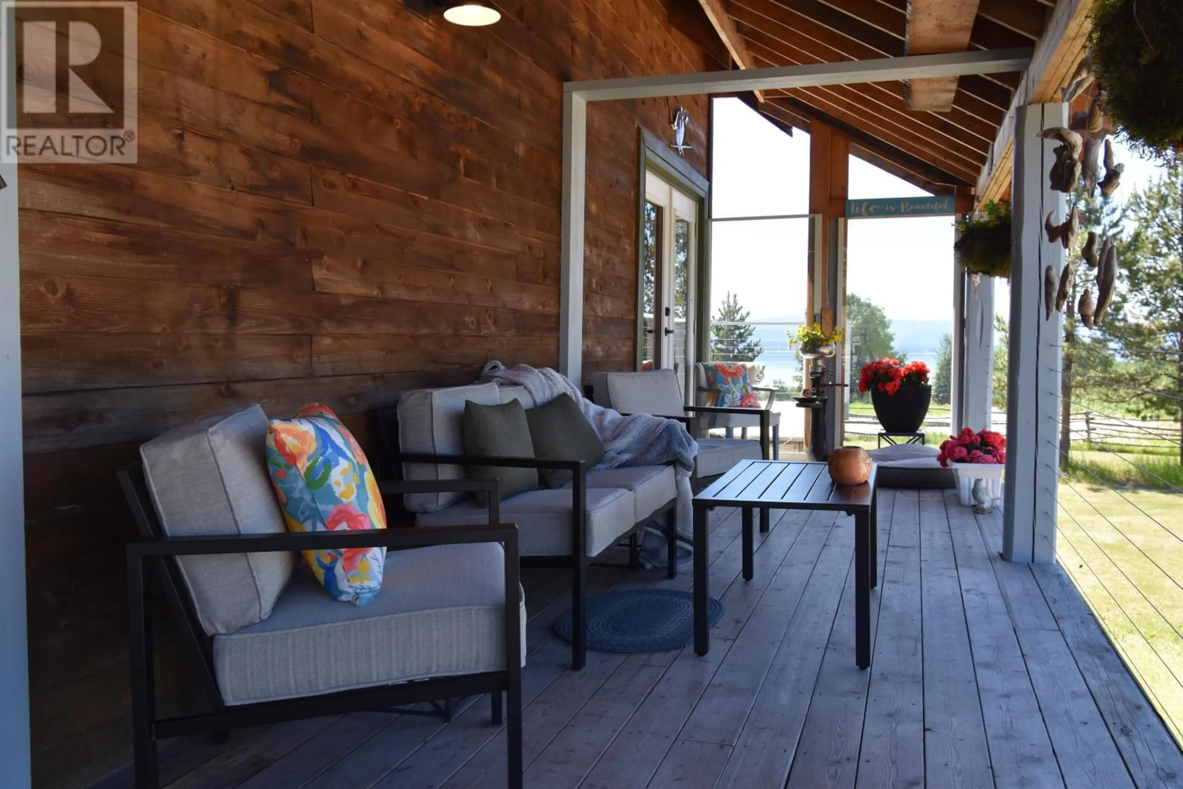 A pic from outside/outdoor area/front of a property/back of a property/a pic from drone, water/lake/river/ocean view for 58502 OOTSA HILL ROAD, Burns Lake British Columbia V0J1E4