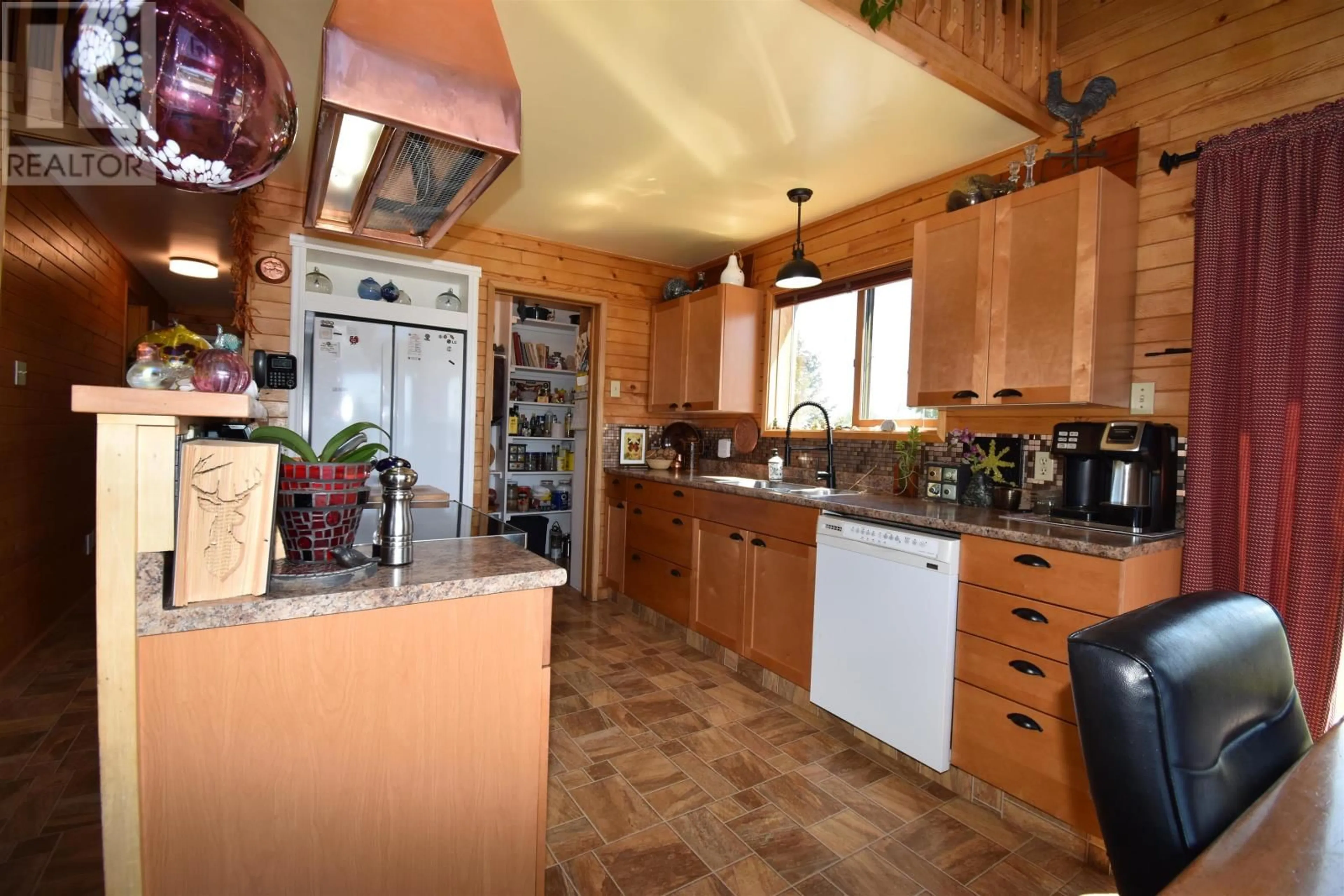 Kitchen, wood floors, cottage for 58502 OOTSA HILL ROAD, Burns Lake British Columbia V0J1E4