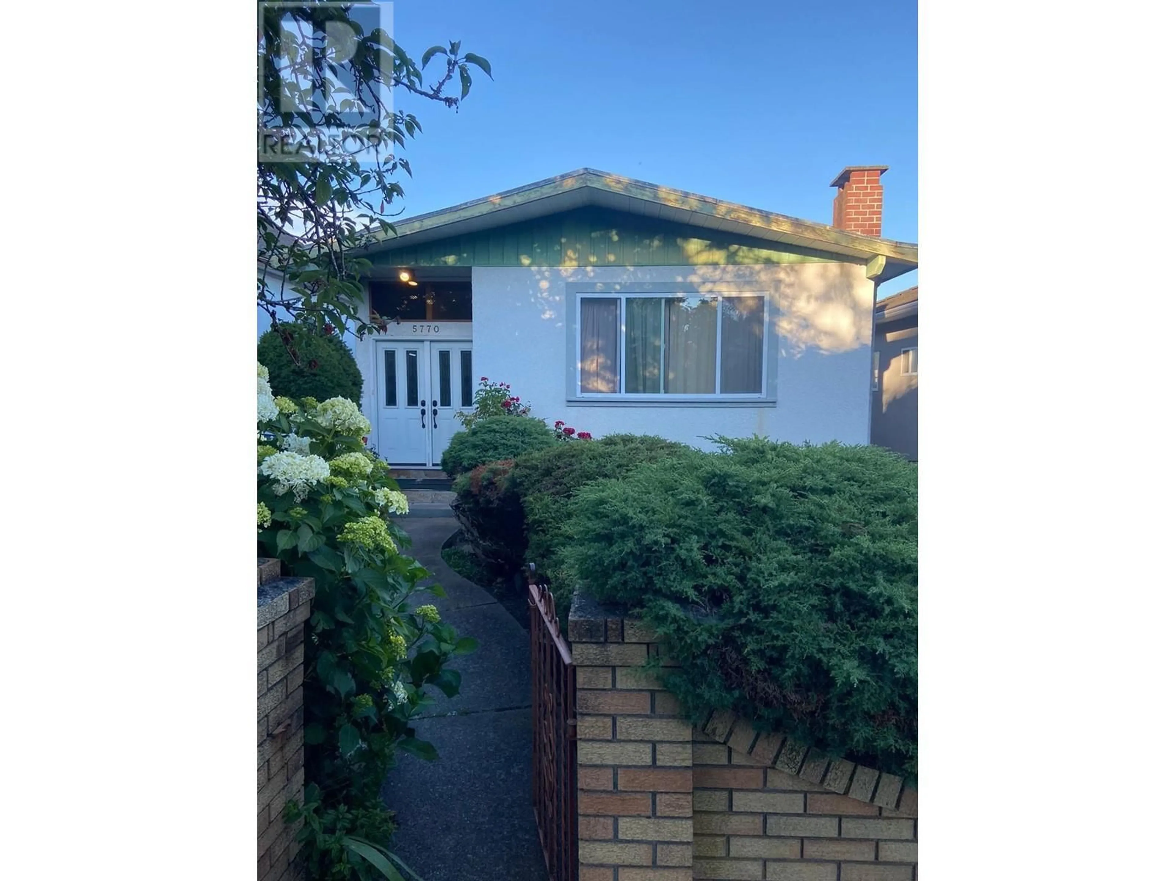 Frontside or backside of a home for 5770 INVERNESS STREET, Vancouver British Columbia V5W3P5