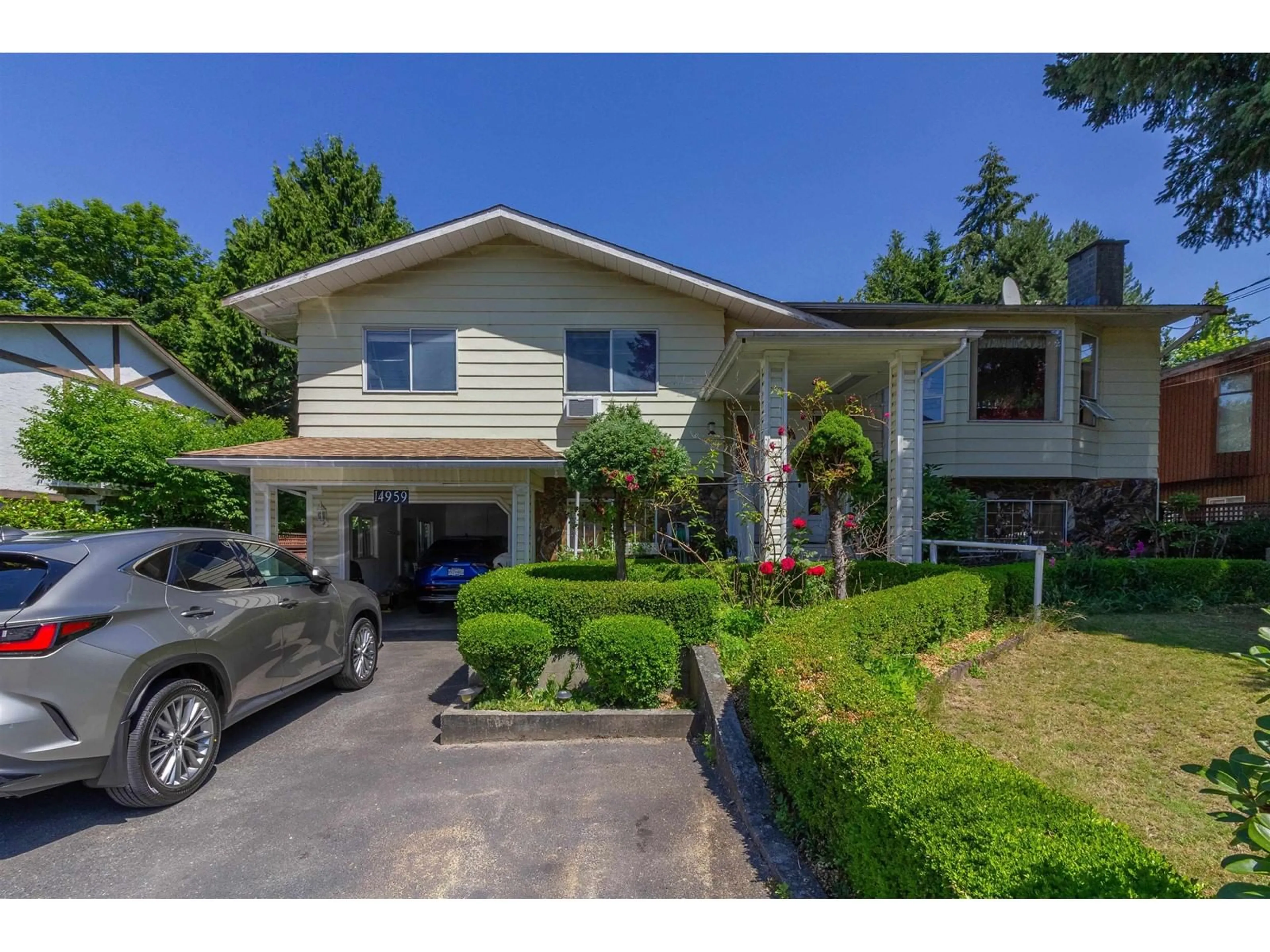 Frontside or backside of a home for 14959 90A AVENUE, Surrey British Columbia V3R1B3