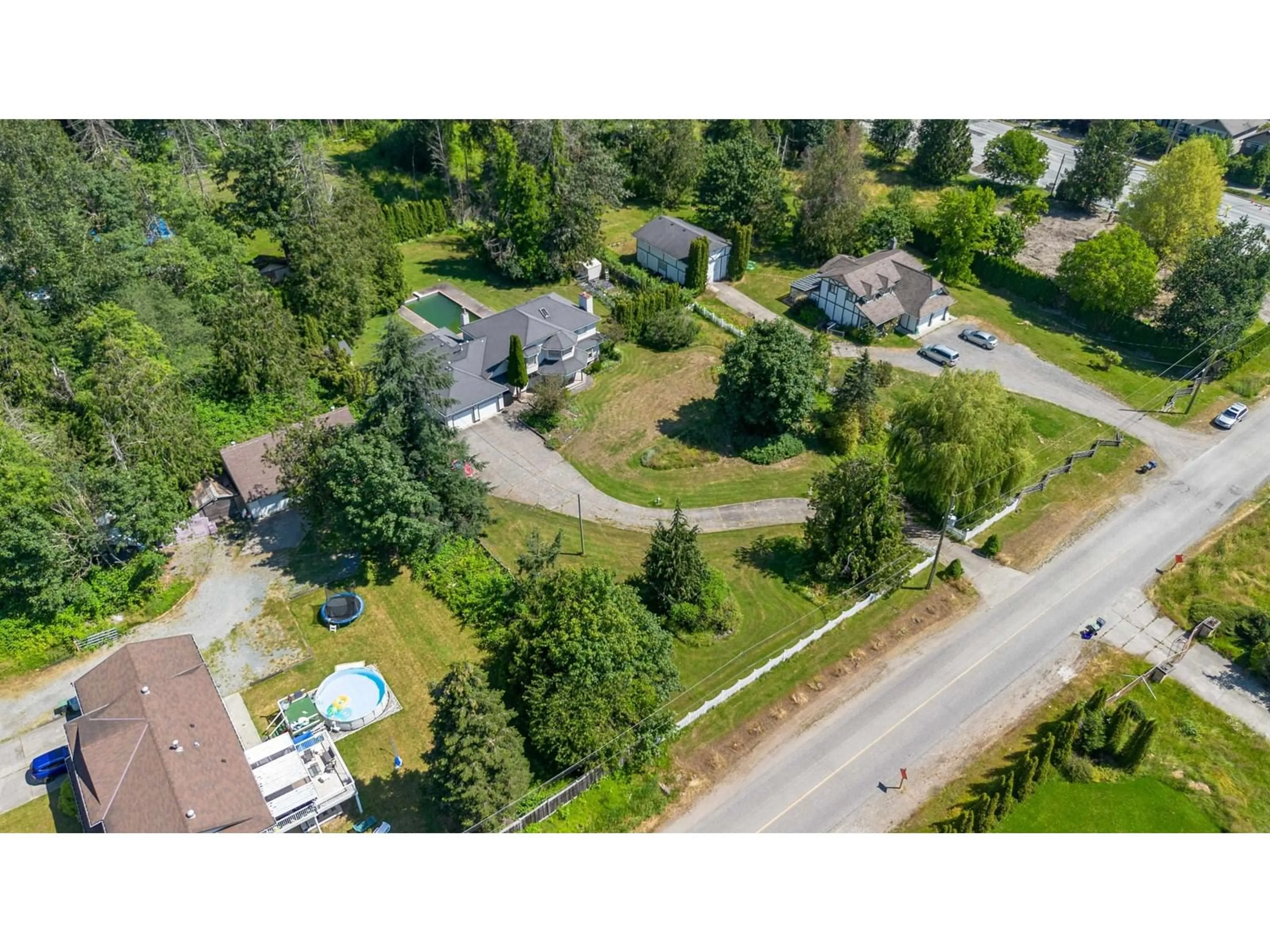 Frontside or backside of a home, the street view for 20745 68 AVENUE, Langley British Columbia V2Y1R1