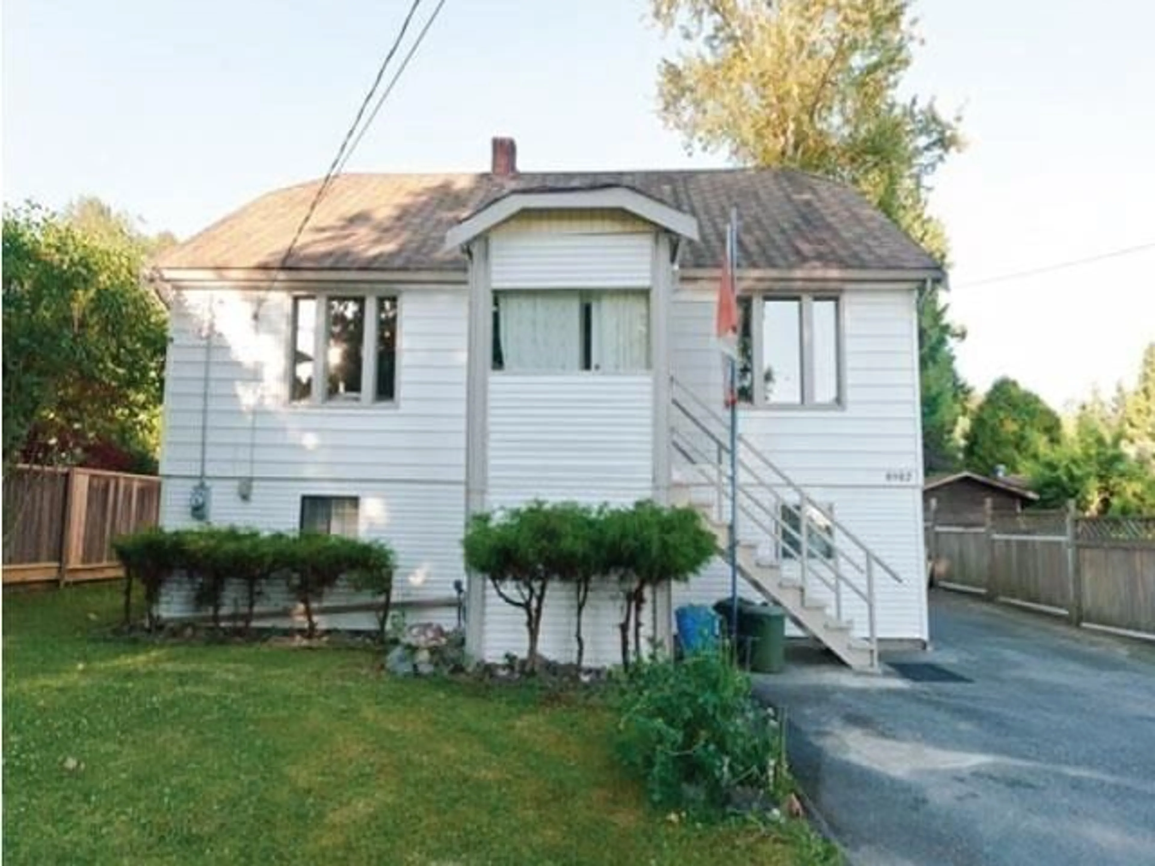 Frontside or backside of a home for 8982 148 STREET, Surrey British Columbia V3R3W4
