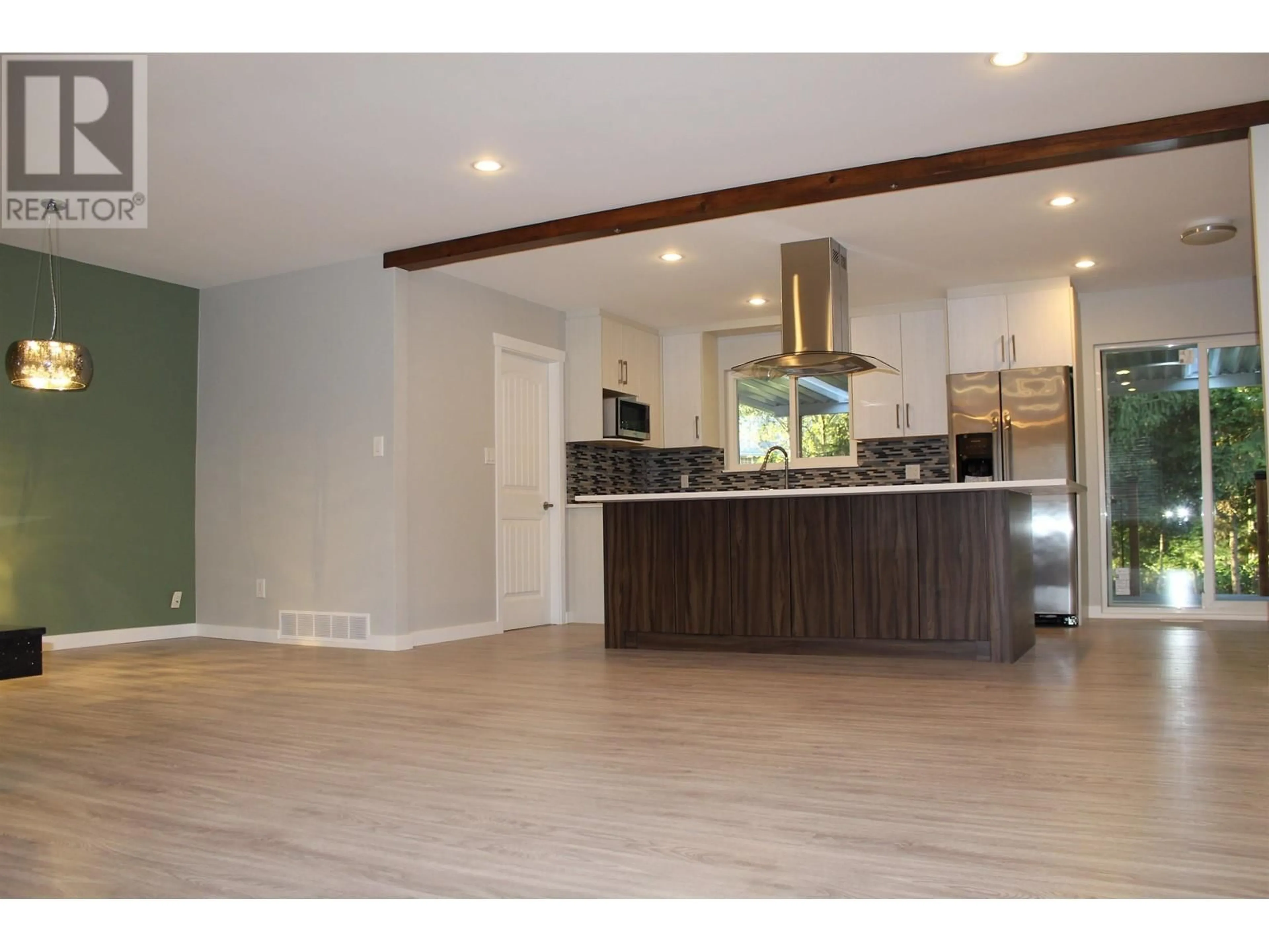 Open concept kitchen, wood/laminate floor for 22489 BRICKWOOD CLOSE, Maple Ridge British Columbia V2X2E6