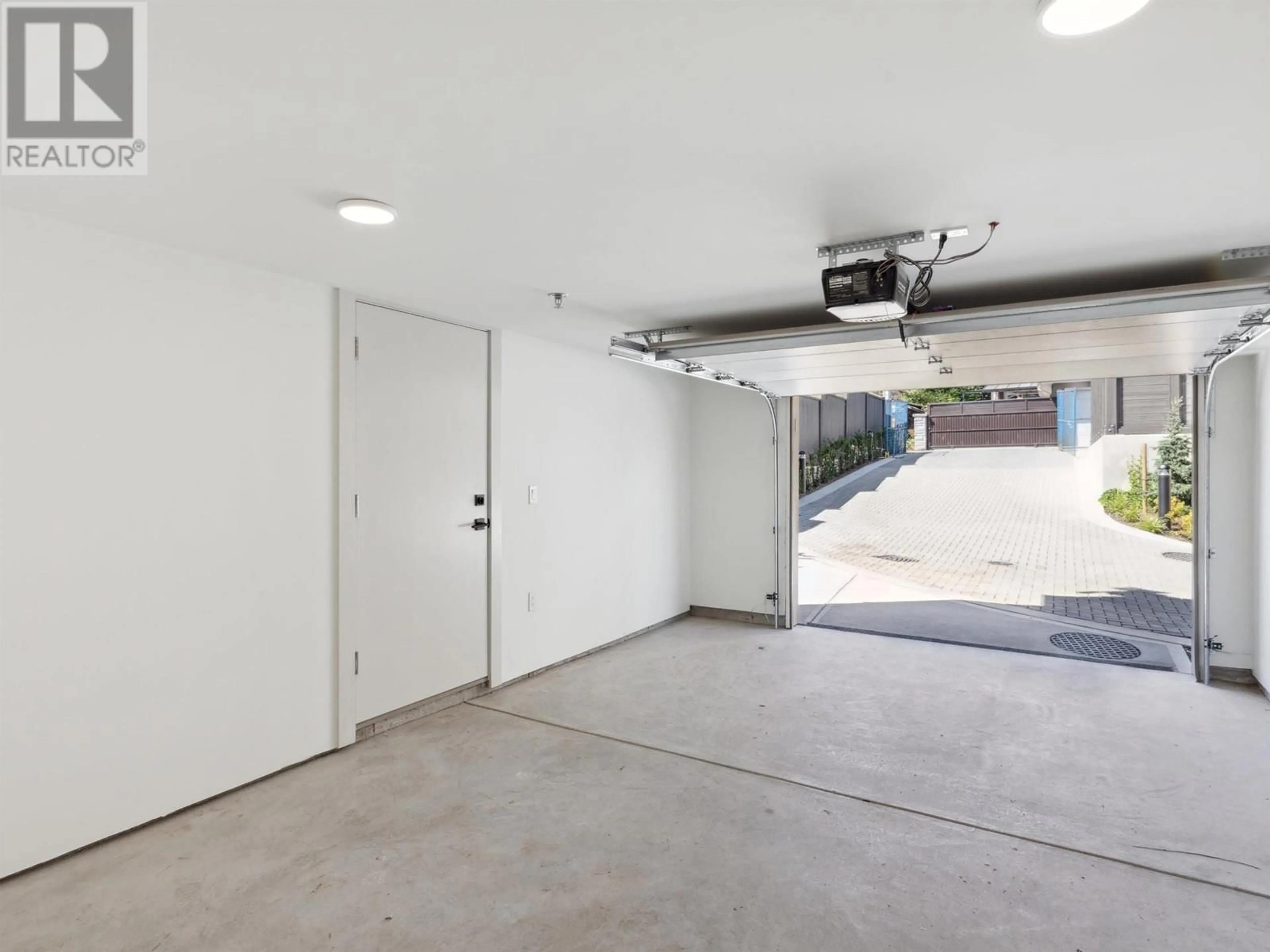 Indoor garage, cement floor for 1 632 E 3RD STREET, North Vancouver British Columbia V7L1G7