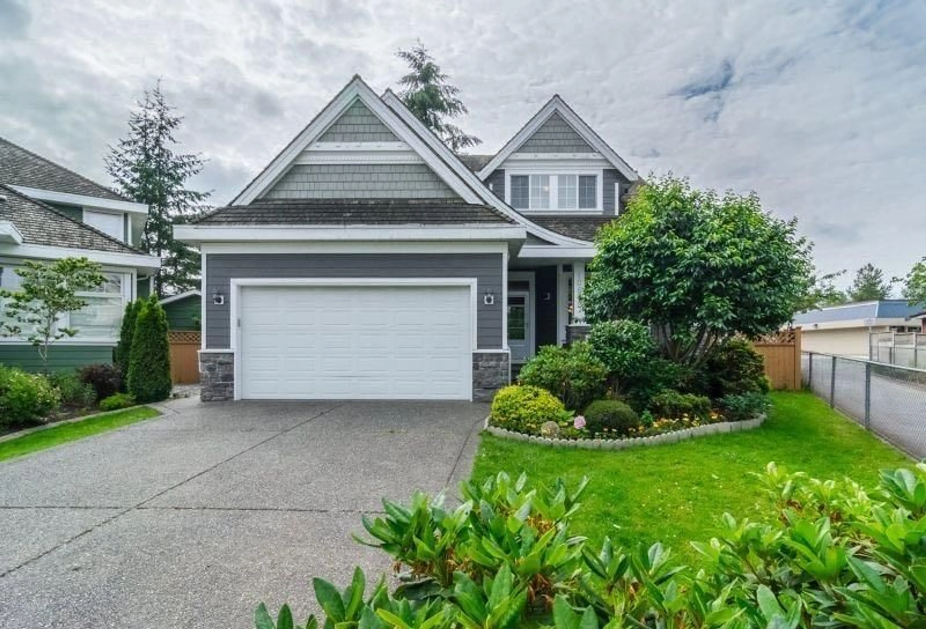 Home with vinyl exterior material, street for 10672 164A, Surrey British Columbia V4N5J3