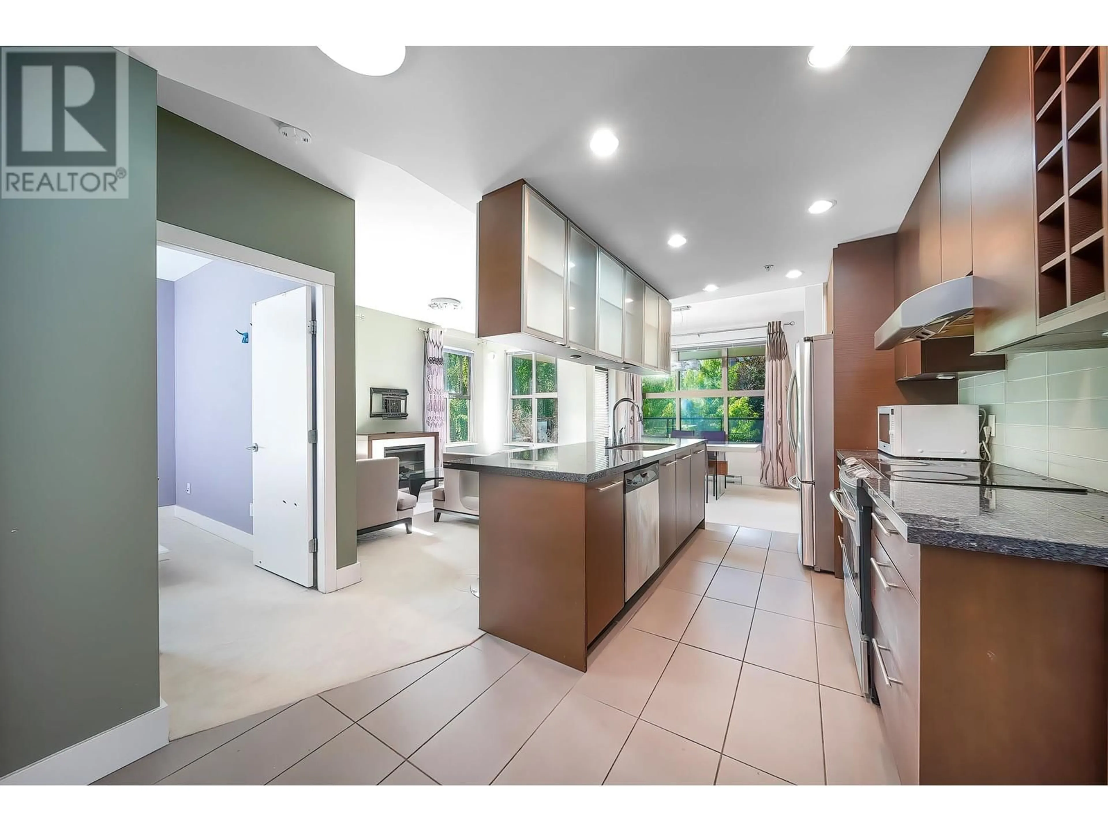 Open concept kitchen for 311 3478 WESBROOK MALL, Vancouver British Columbia V6S0B6