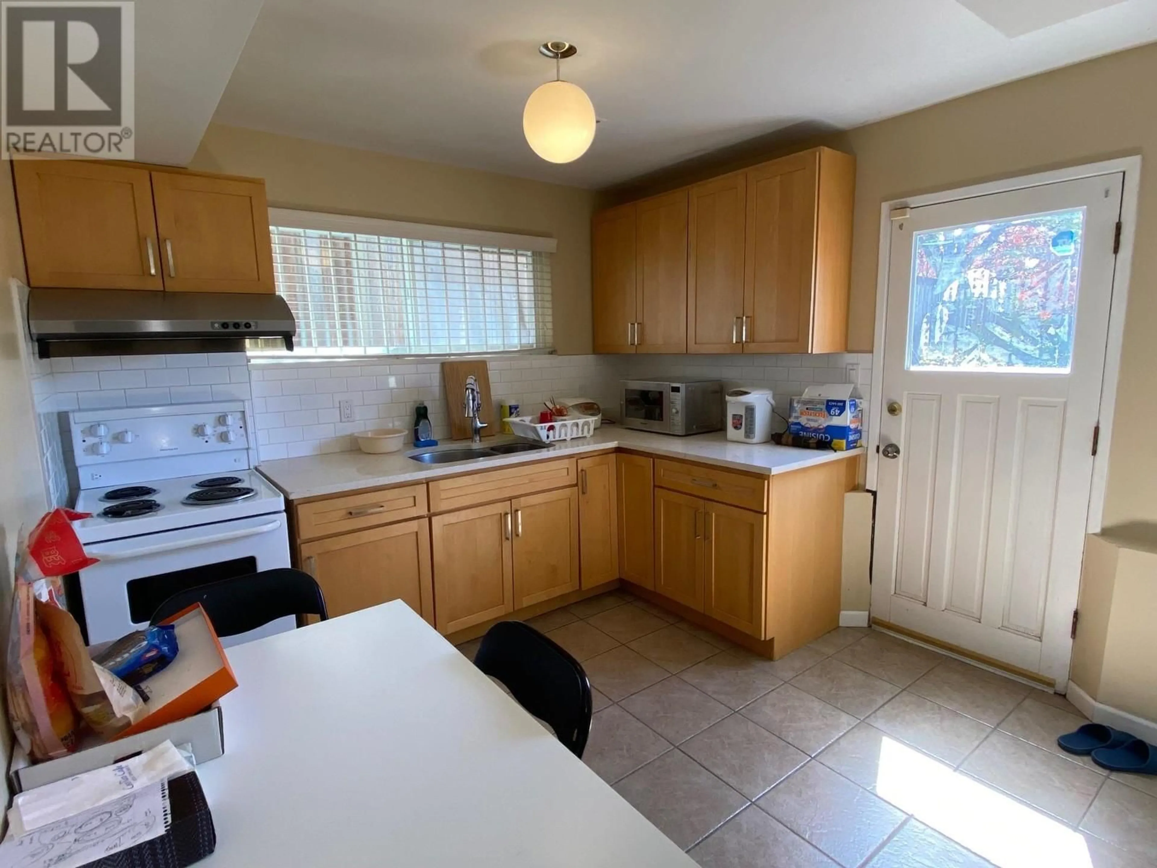 Standard kitchen, wood floors, cottage for 2056 W 29TH AVENUE, Vancouver British Columbia V6J3A1