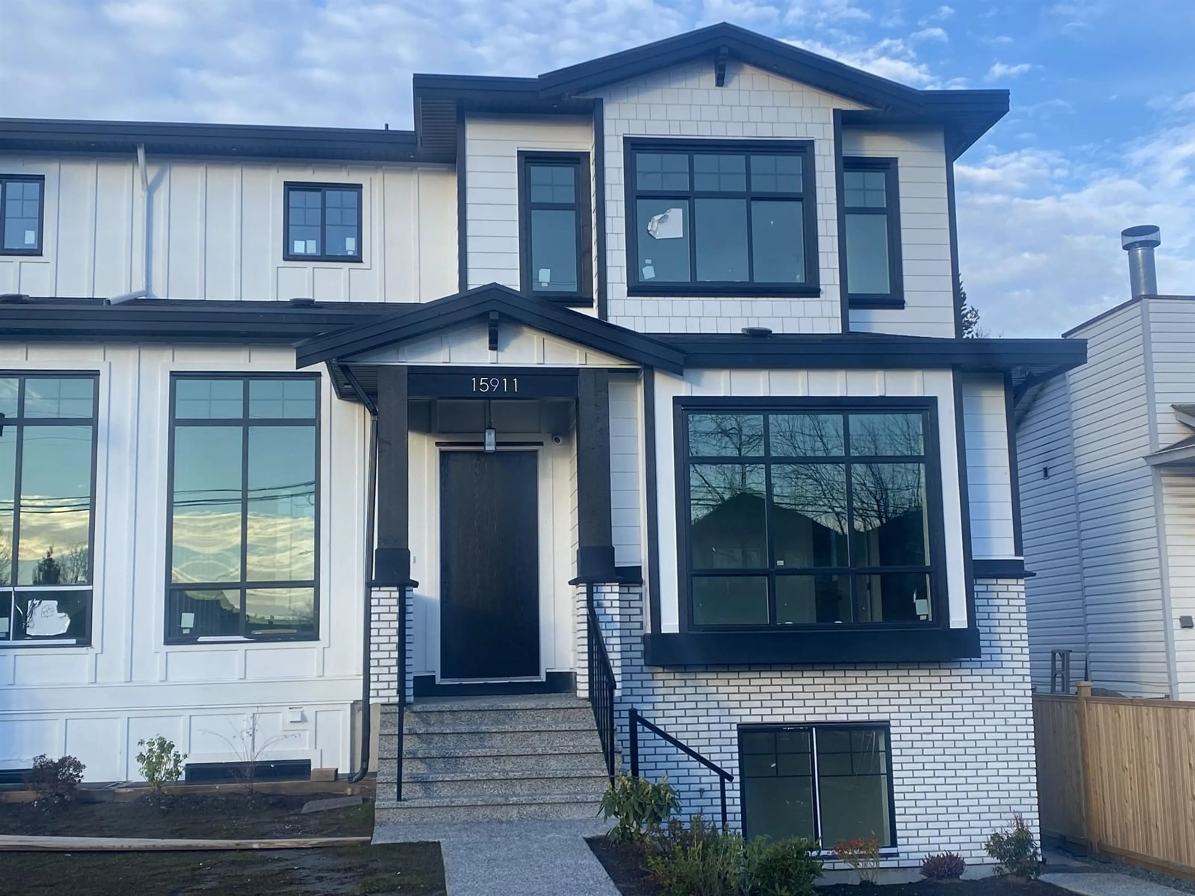 Home with vinyl exterior material, street for 15903 88 AVENUE, Surrey British Columbia V4N1H6