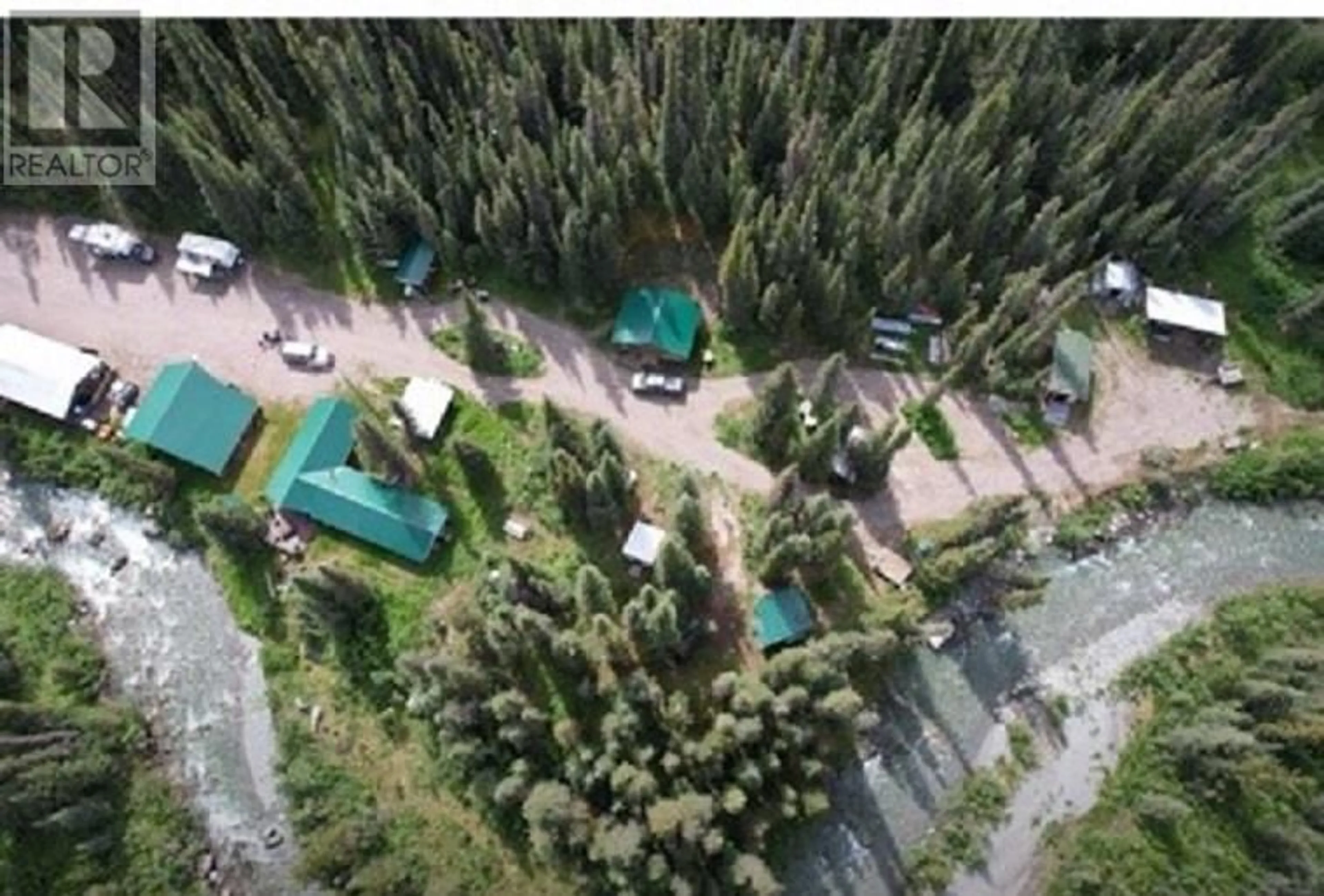 A pic from outside/outdoor area/front of a property/back of a property/a pic from drone, forest/trees view for DL - 6349 CASSIAR ROAD, Cassiar British Columbia V0C1E0