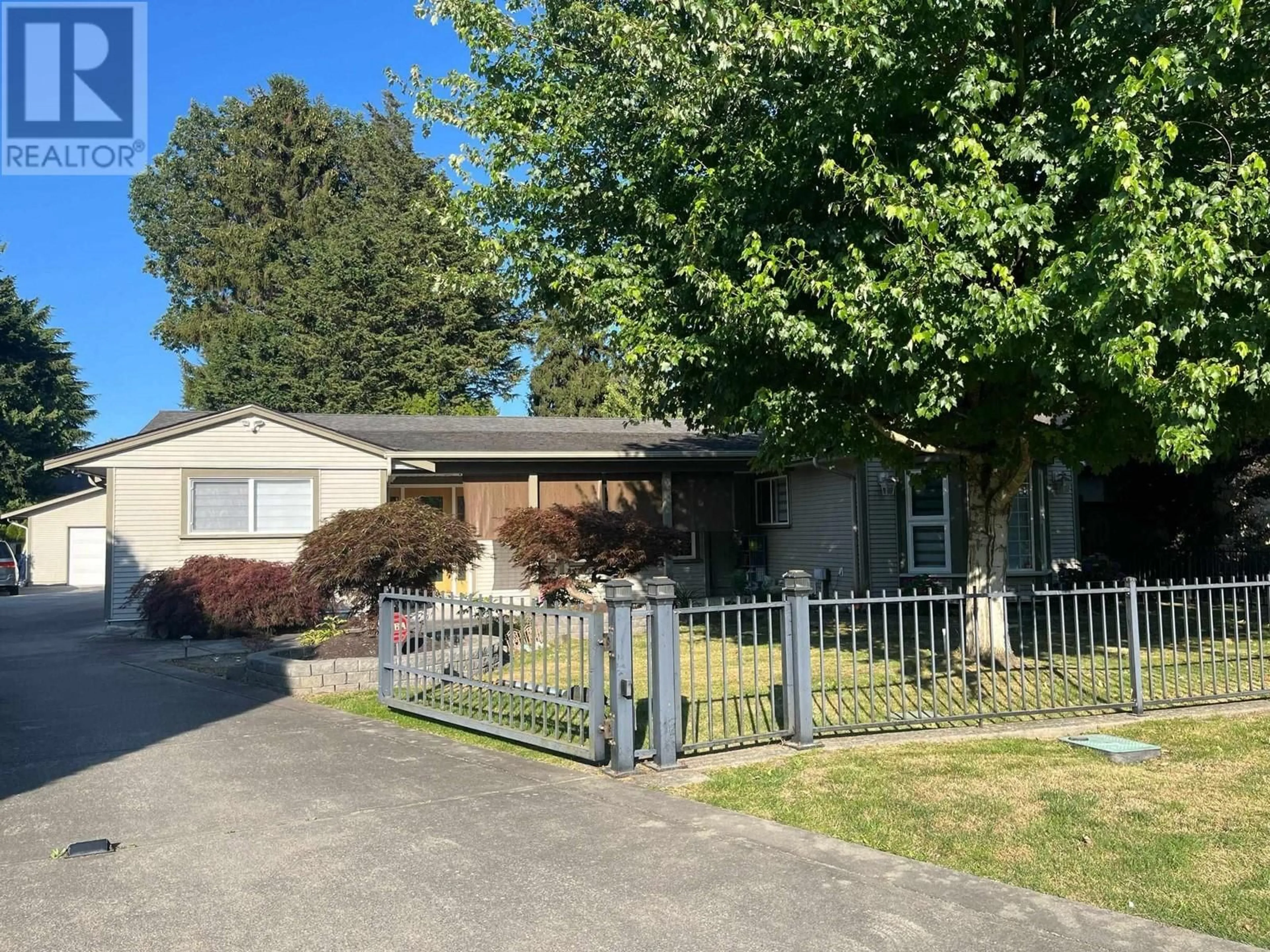 Frontside or backside of a home, the fenced backyard for 10060 SWINTON CRESCENT, Richmond British Columbia V7A3T1