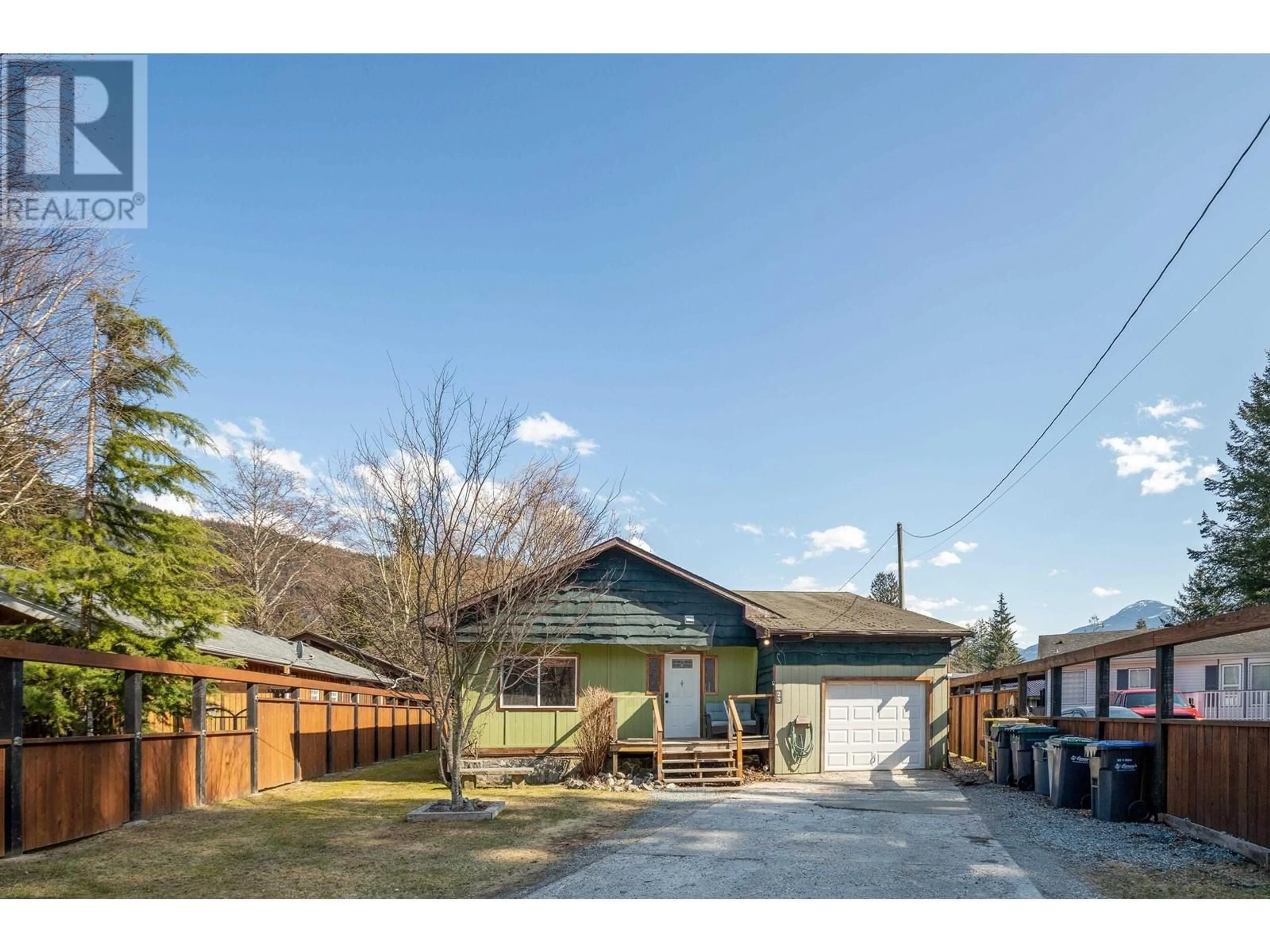 Frontside or backside of a home, the fenced backyard for 23 BRACKEN PARKWAY, Squamish British Columbia V0N1T0