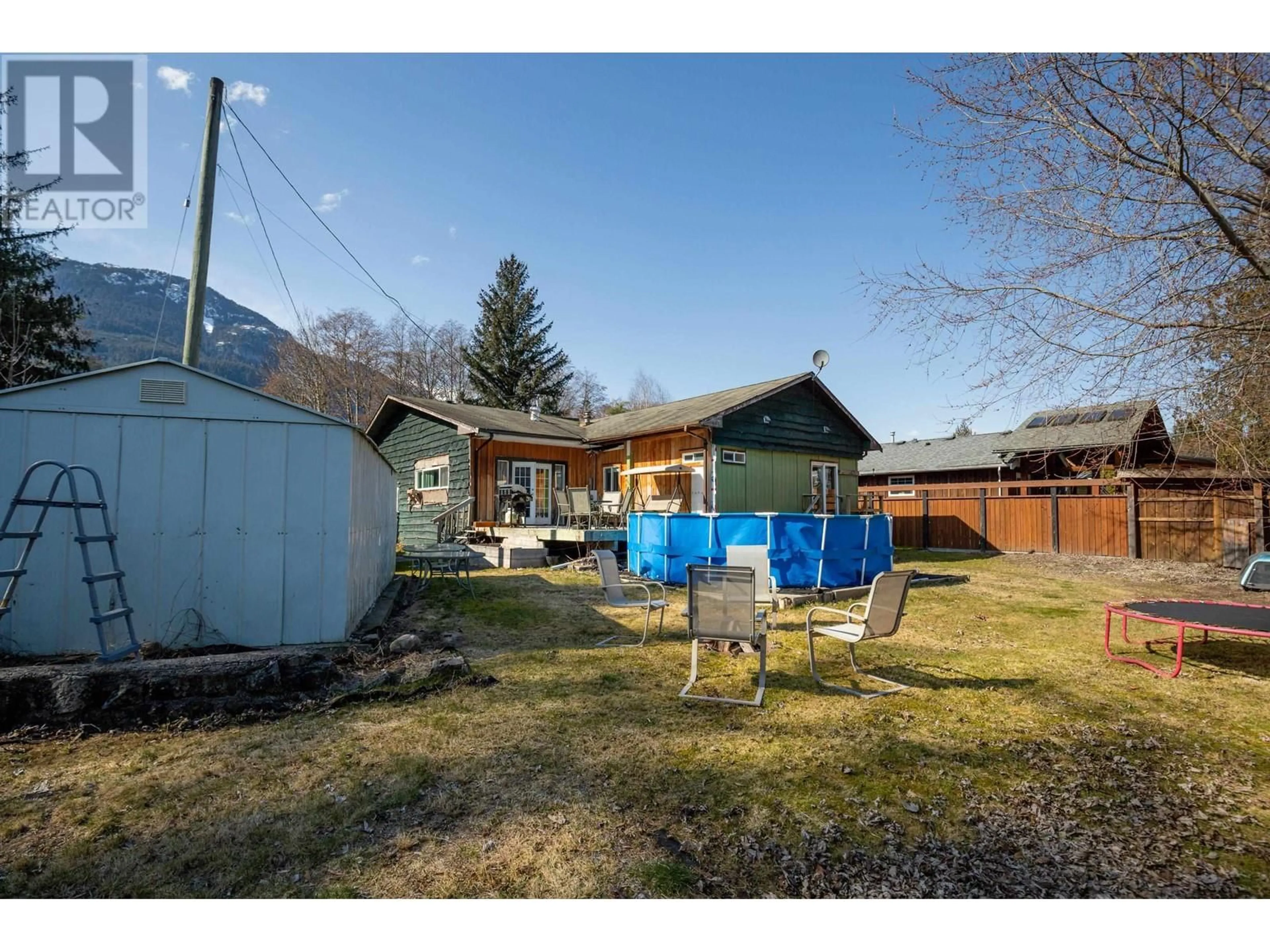 Frontside or backside of a home, the fenced backyard for 23 BRACKEN PARKWAY, Squamish British Columbia V0N1T0