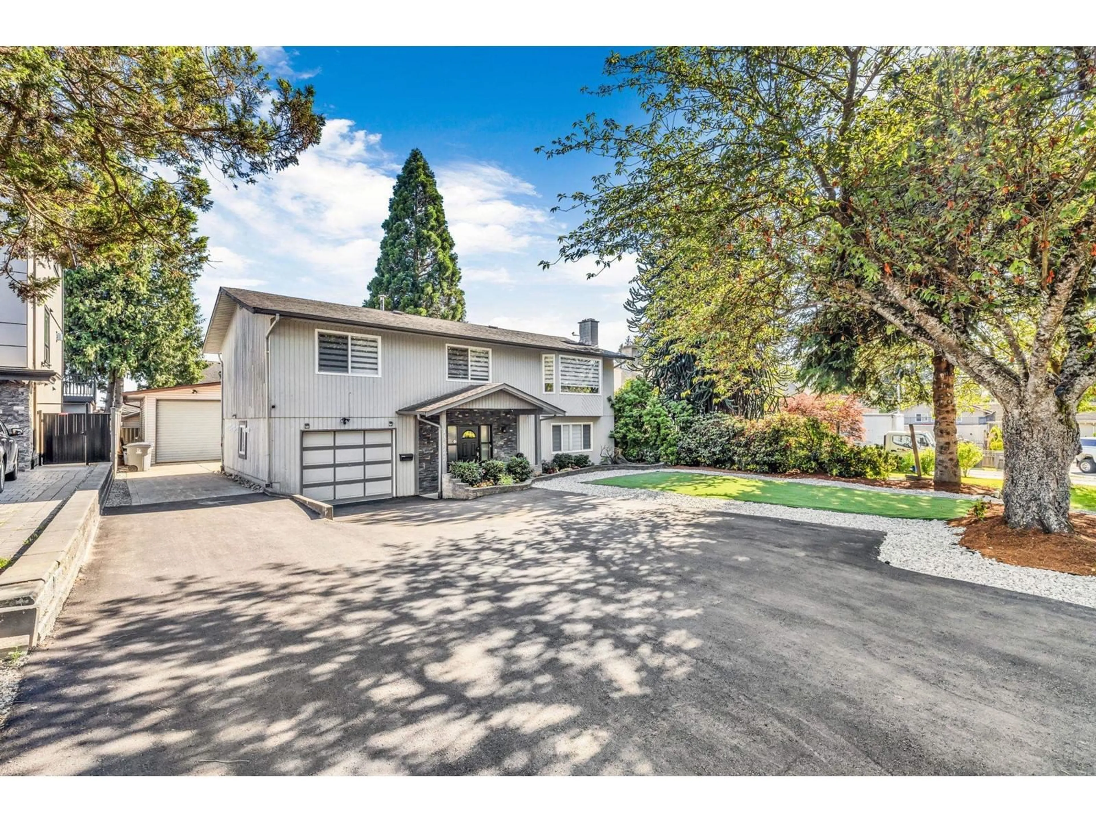 Frontside or backside of a home for 13822 92A AVENUE, Surrey British Columbia V3V6Y6