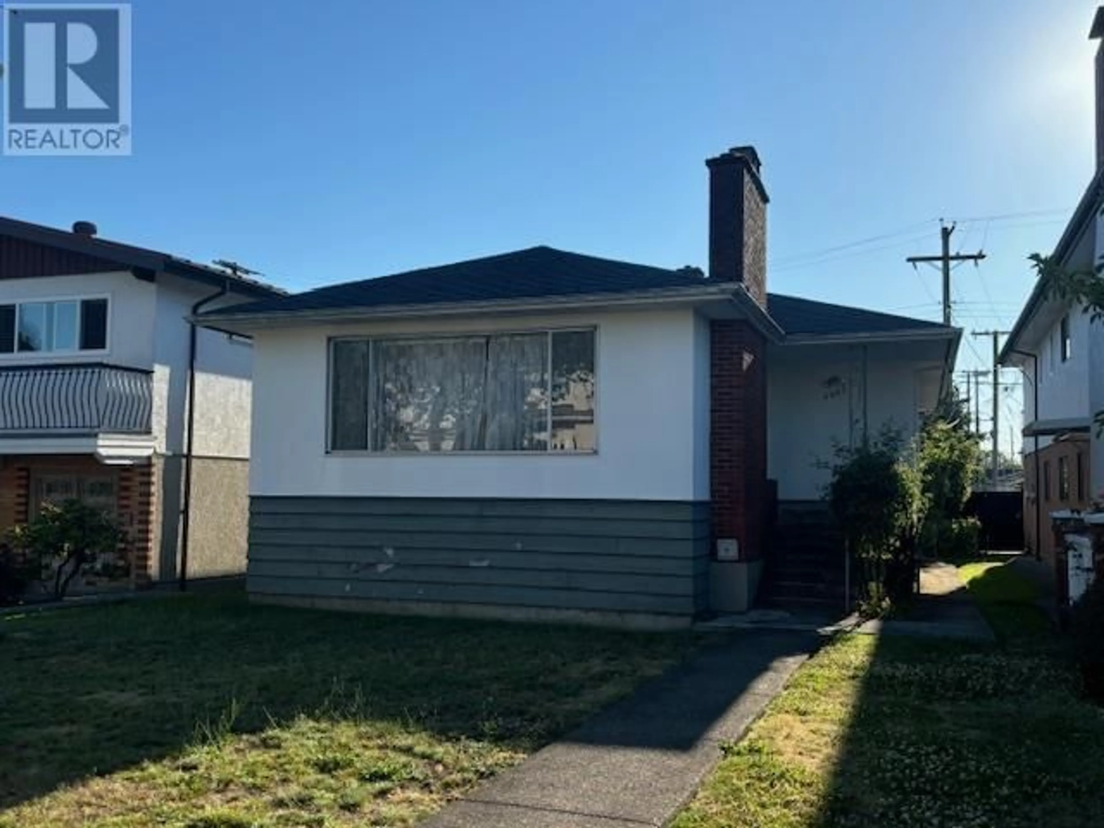 Frontside or backside of a home for 6955 GLADSTONE STREET, Vancouver British Columbia V5P4G4