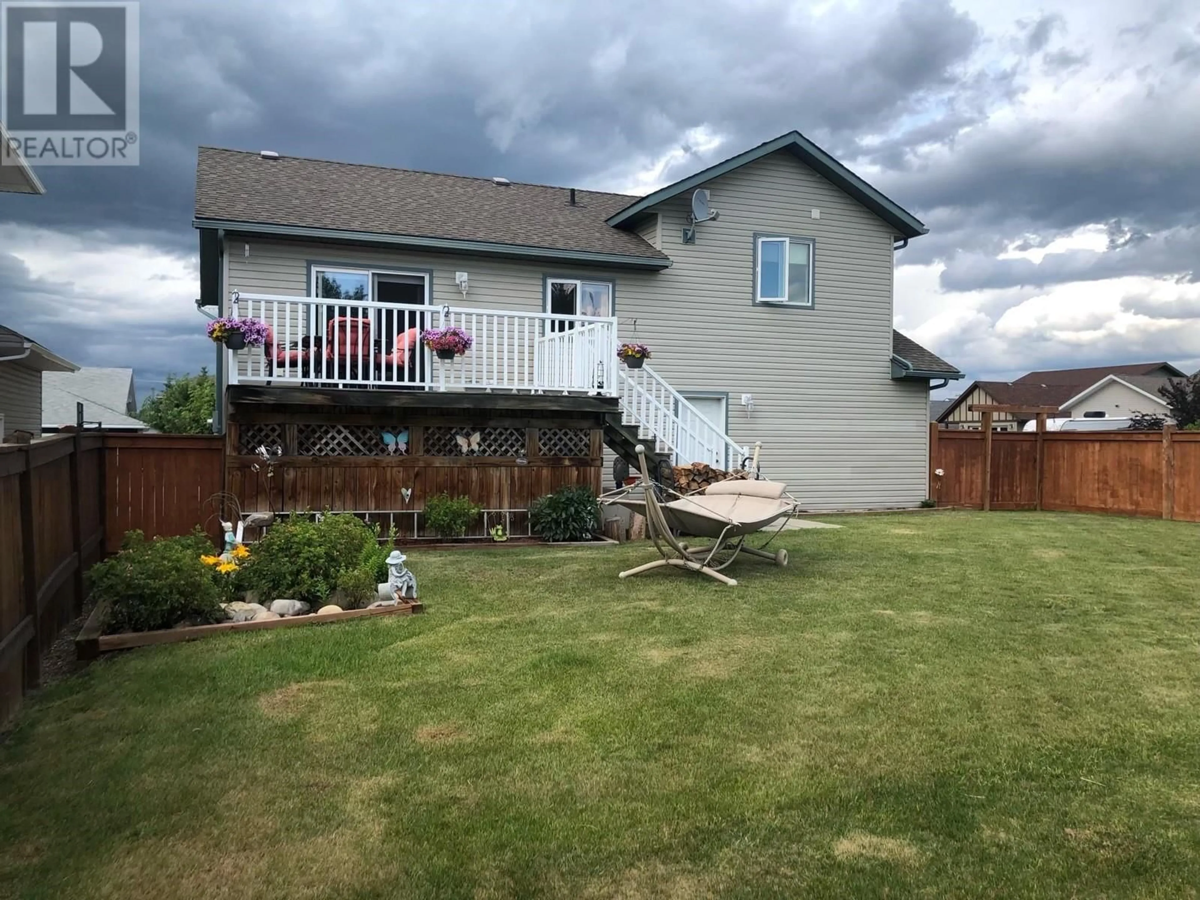 Frontside or backside of a home for 9103 118 AVENUE, Fort St. John British Columbia V1J7J4