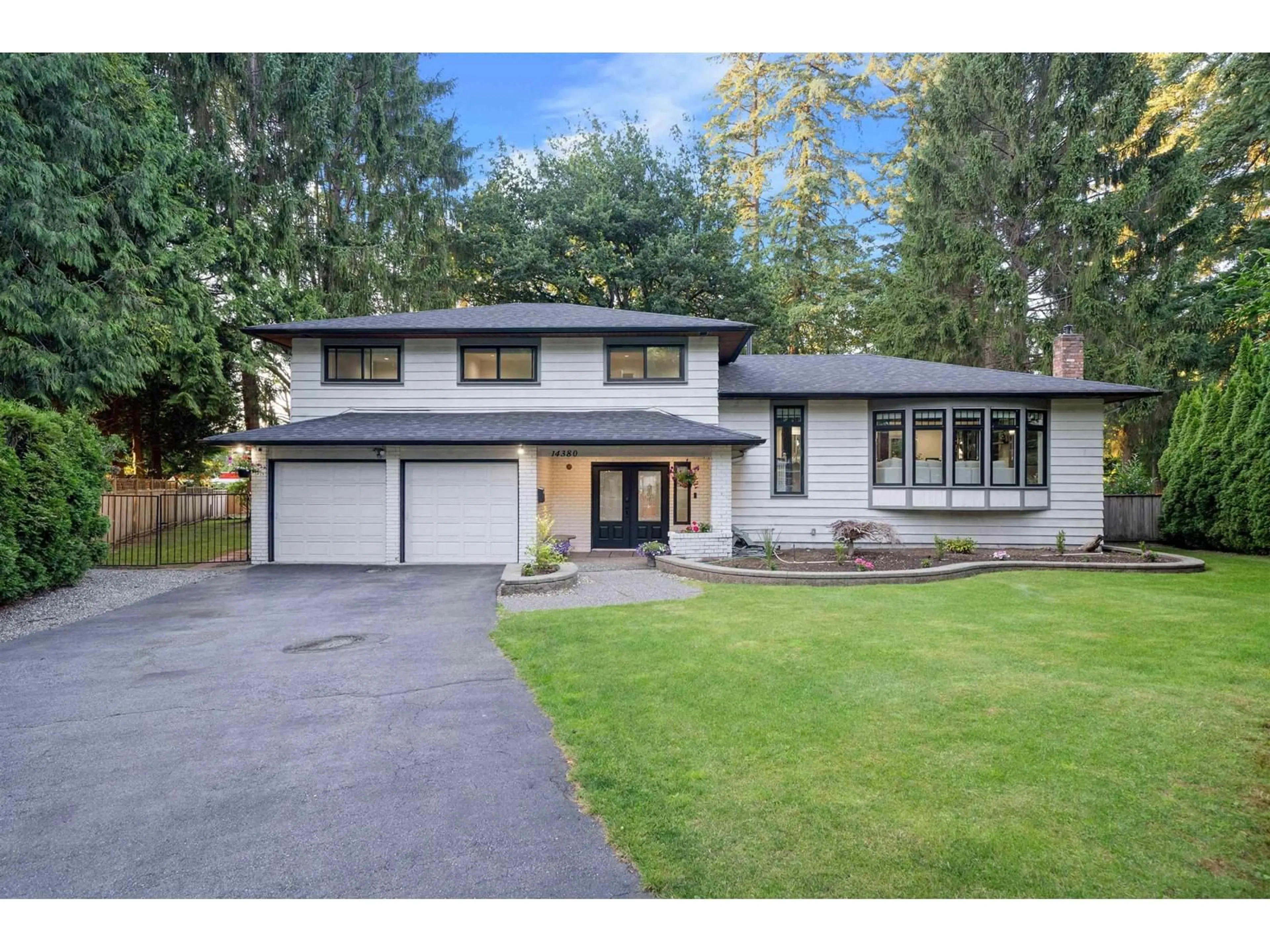 Frontside or backside of a home for 14380 GREENCREST DRIVE, Surrey British Columbia V4P1M1