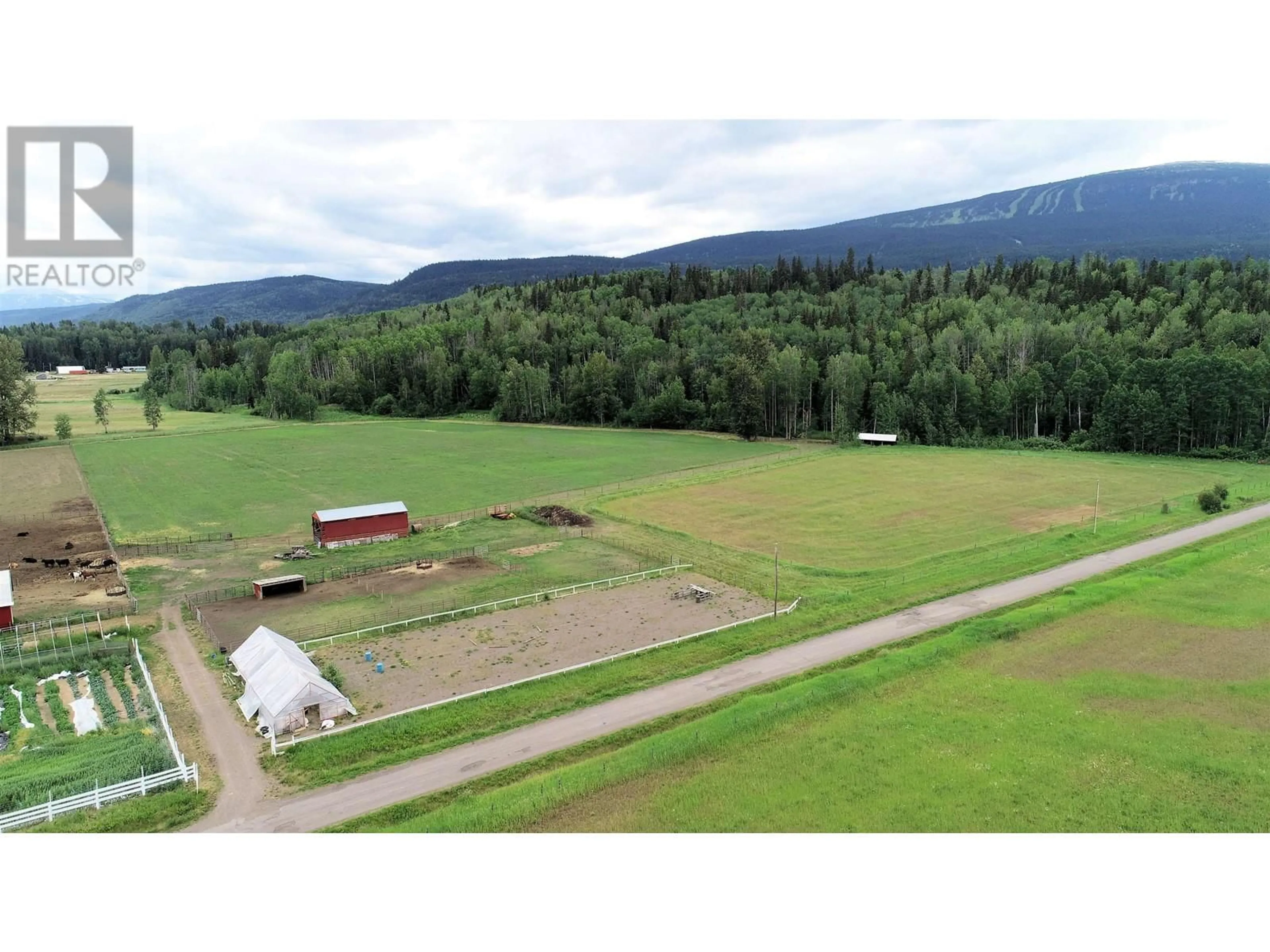 A pic from outside/outdoor area/front of a property/back of a property/a pic from drone, mountain view for 2805 DOHLER ROAD, Smithers British Columbia V0J2N4