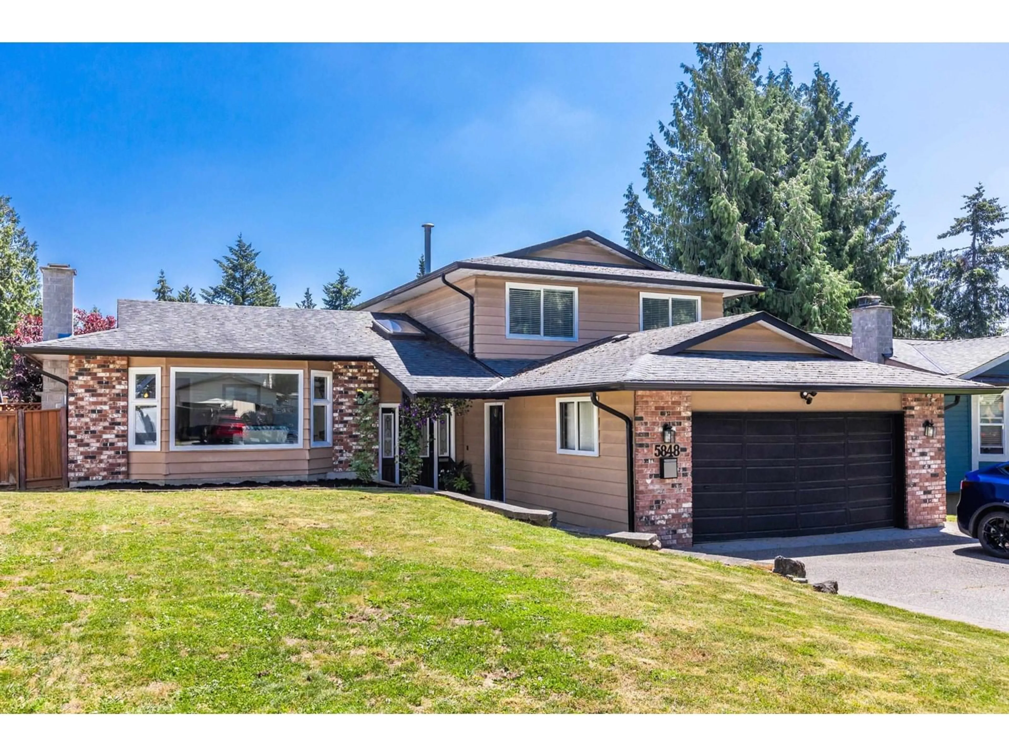 Frontside or backside of a home for 5848 170A STREET, Surrey British Columbia V3S5V1