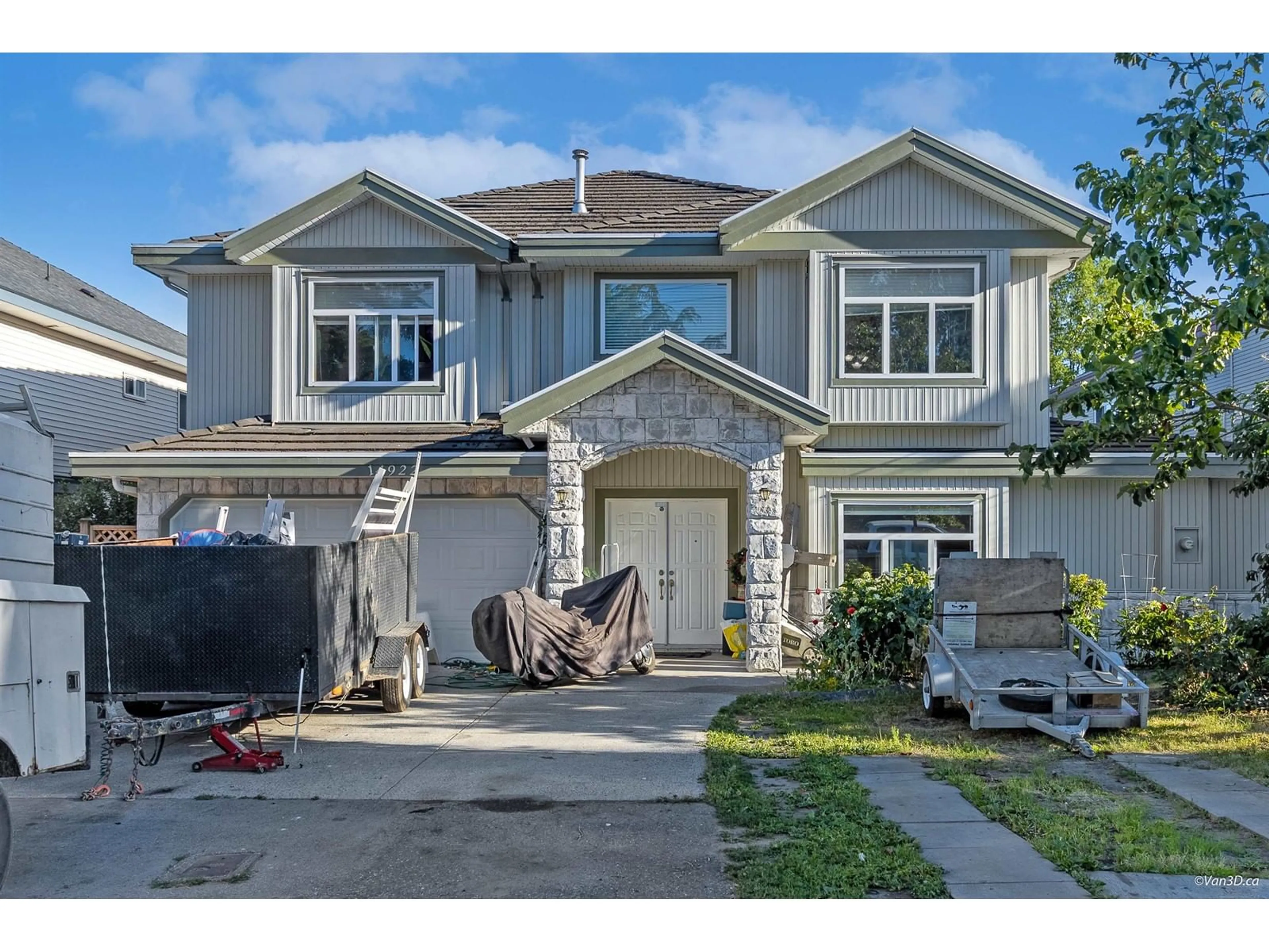 Frontside or backside of a home for 14922 102A AVENUE, Surrey British Columbia V3R1K9