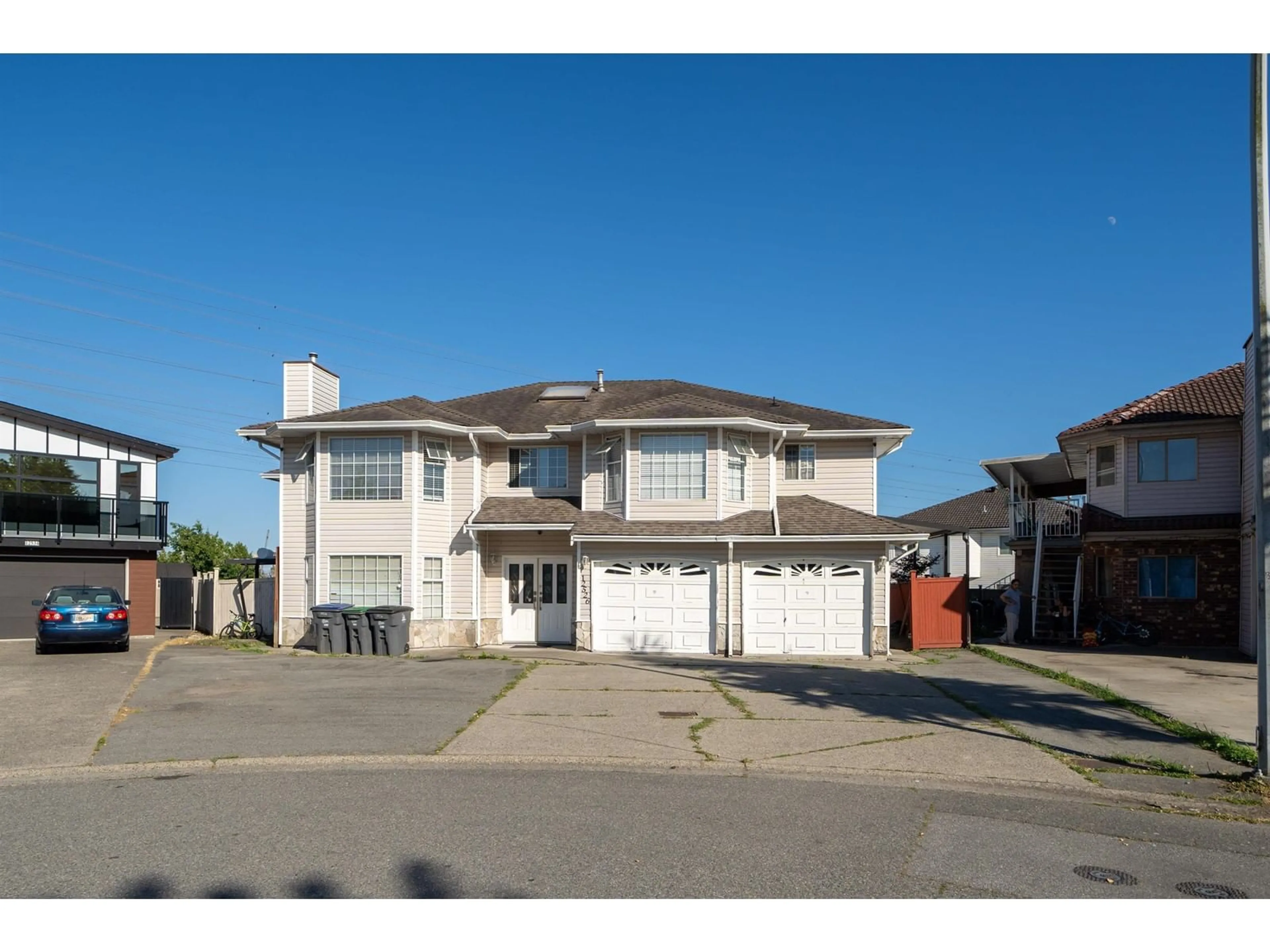 Frontside or backside of a home for 12526 75A AVENUE, Surrey British Columbia V3W0M3