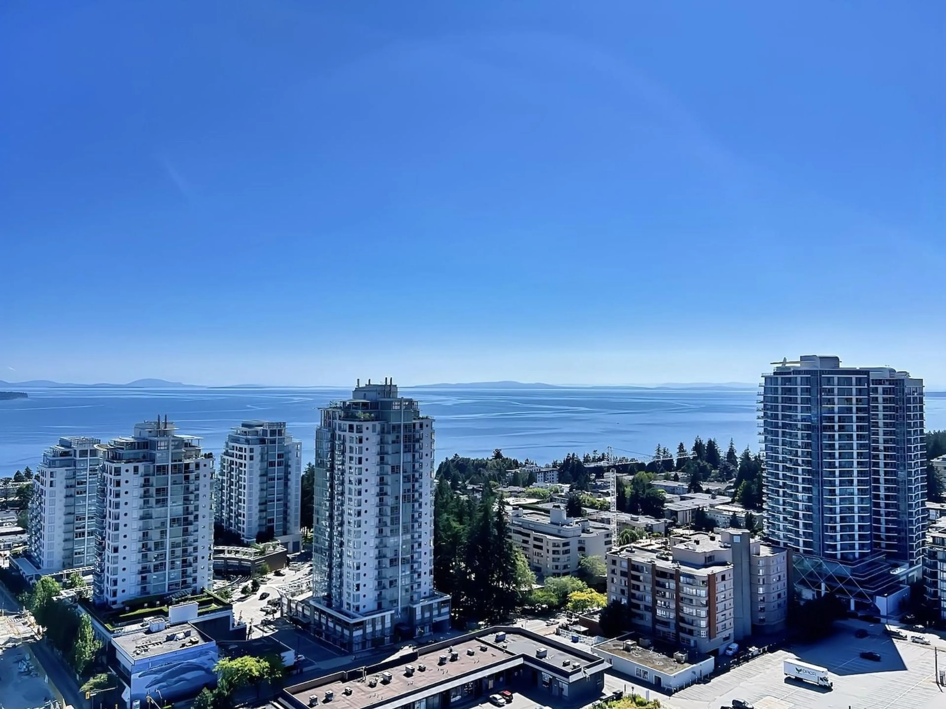 A pic from exterior of the house or condo, the view of city buildings for 2304 1588 JOHNSTON STREET, White Rock British Columbia V3S9X2